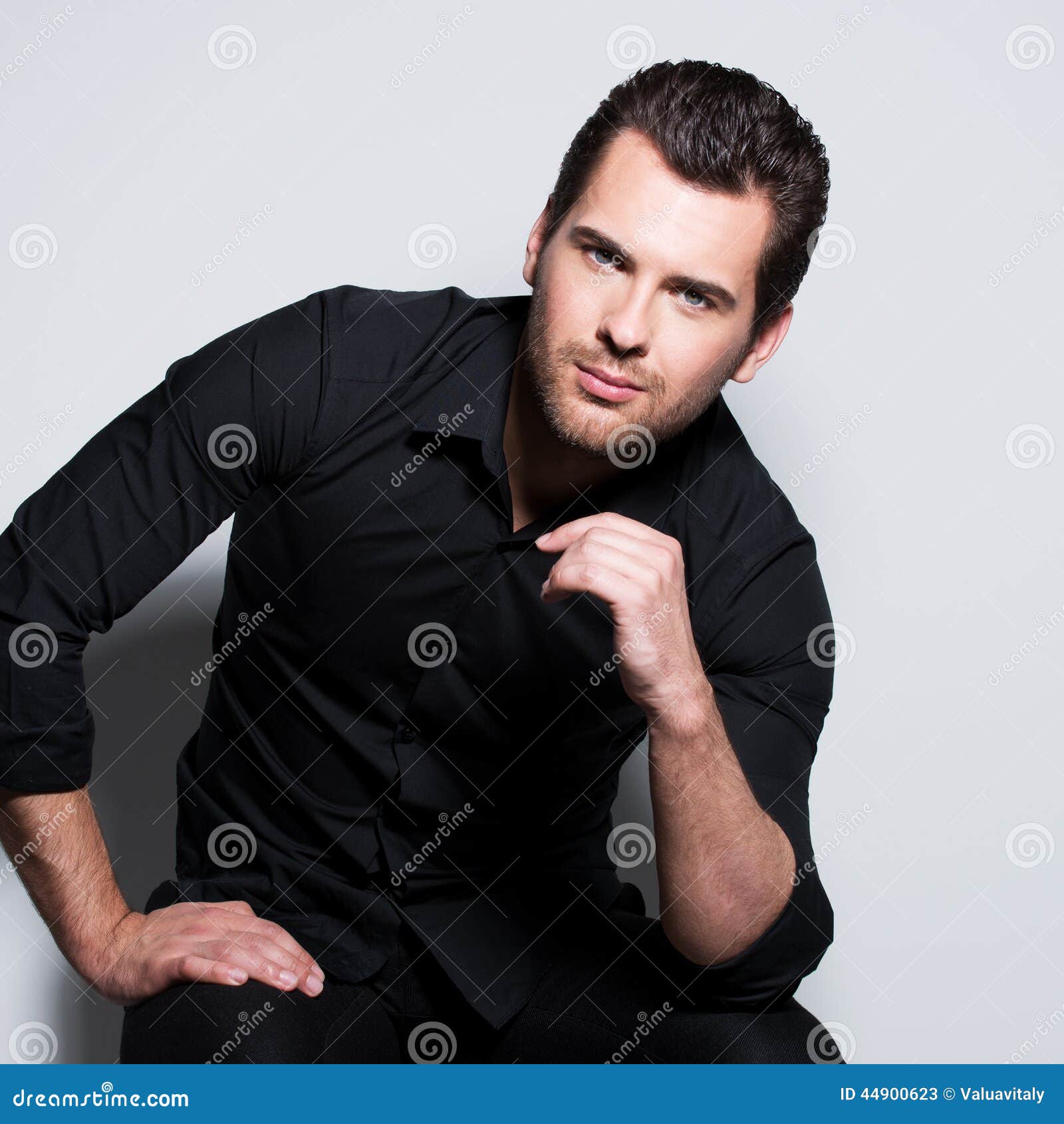 Men's beauty, fashion. full length portrait of a handsome male model posing  in stylish clothes. studio shot. | CanStock