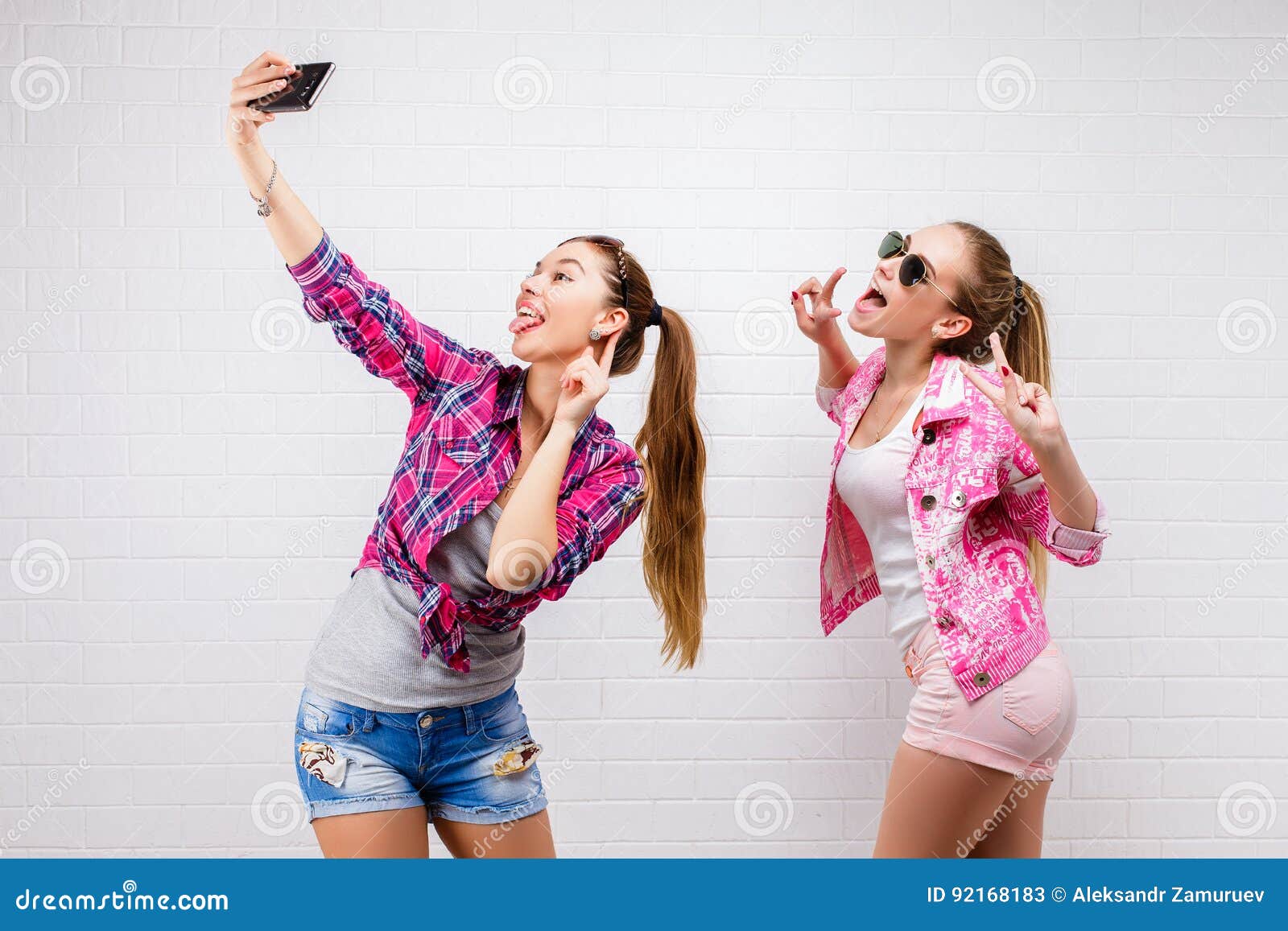 Two women are posing for a black and white photo photo – Free Woman Image  on Unsplash