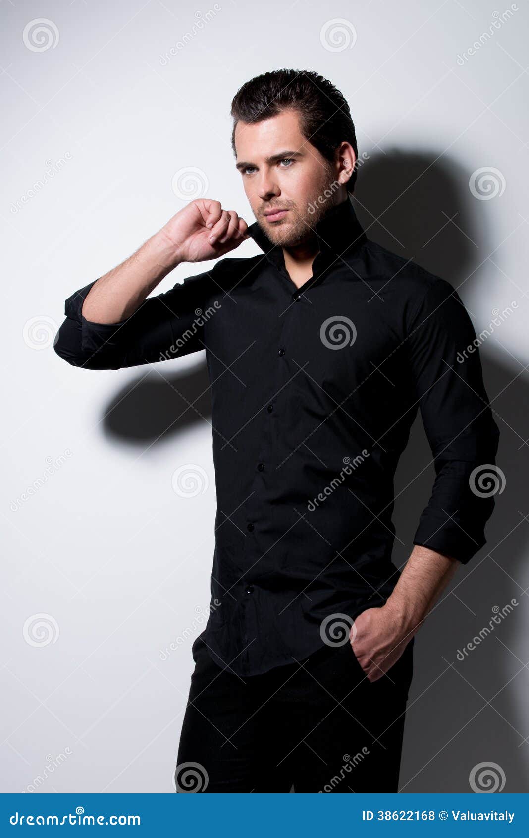 Fashion Portrait of Young Man in Black Shirt . Stock Photo - Image of ...