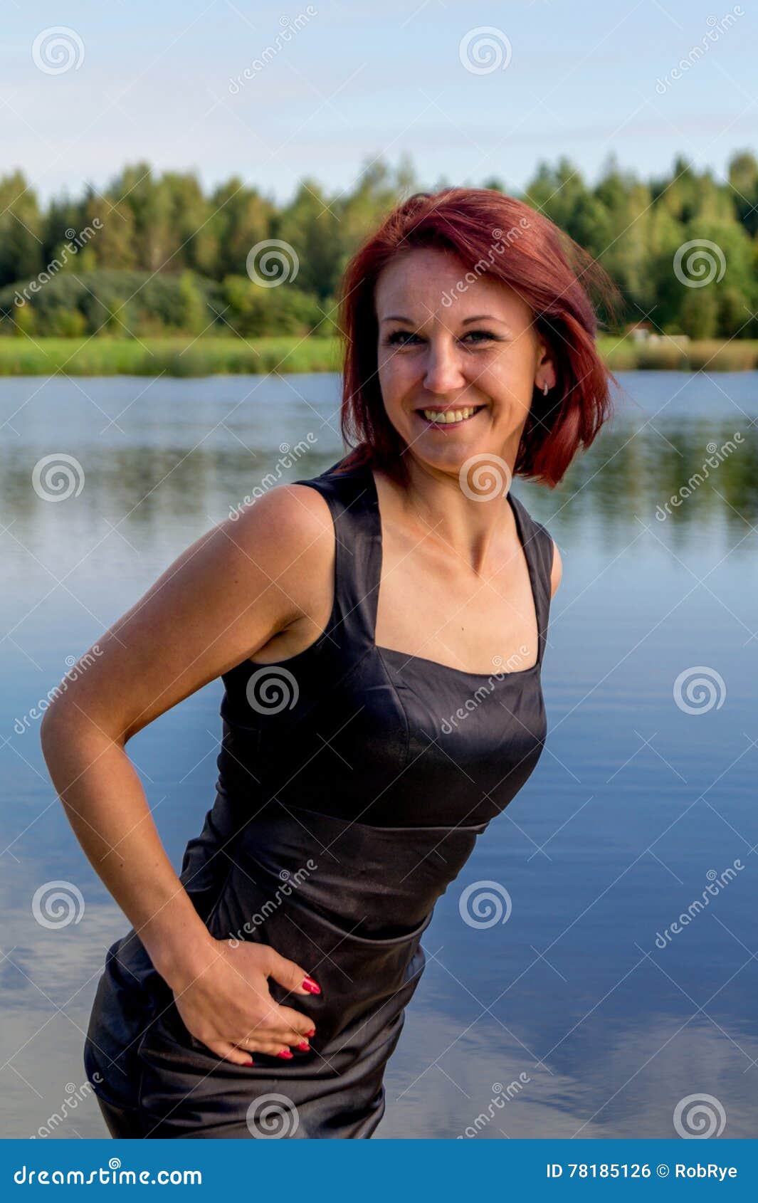 Young Woman Standing Outdoors. Fashion Portrait. Stock 