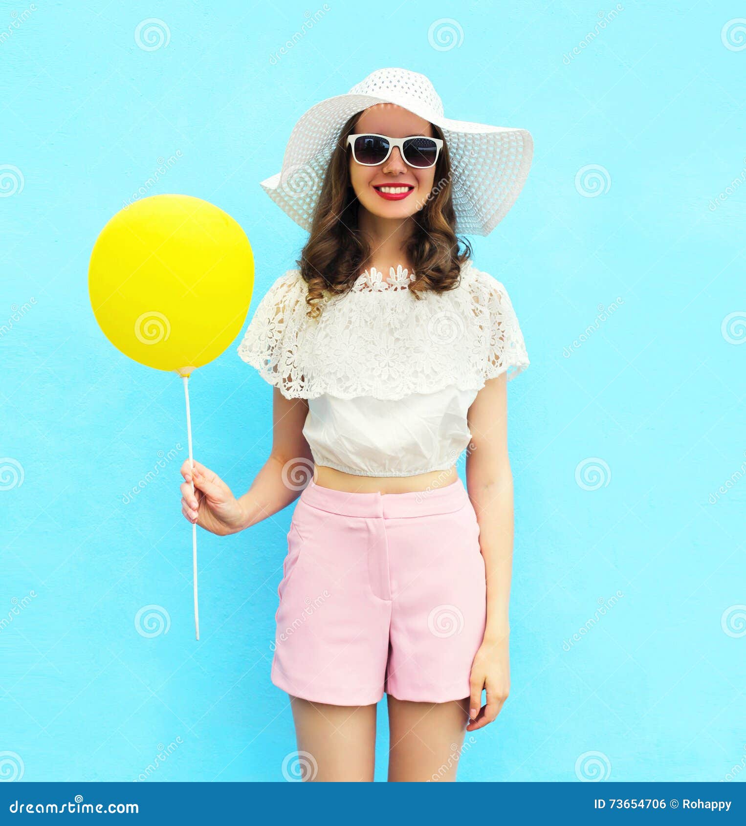 Fashion Pretty Woman in Straw Hat with Air Balloon Over Colorful Blue ...