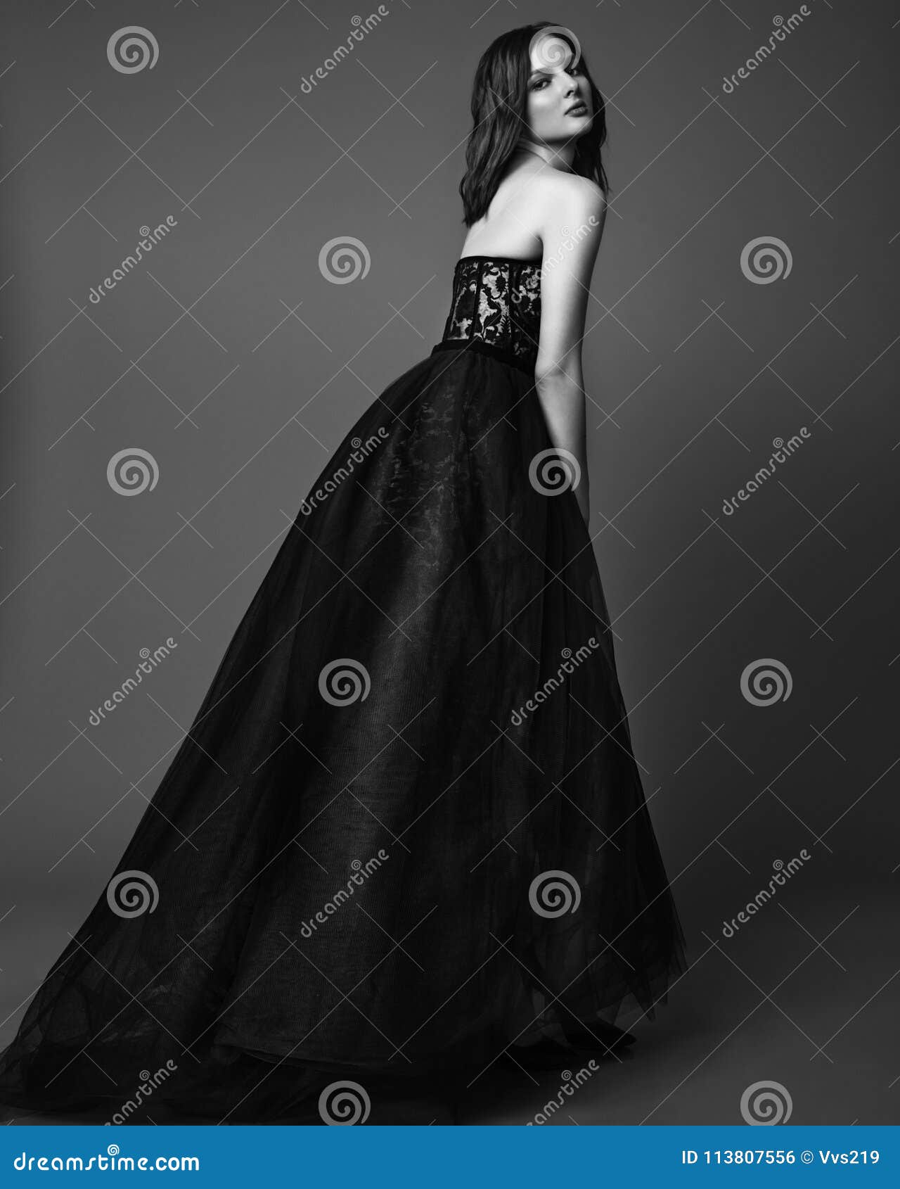 Fashion Studio Photo of Elgant Woman in Long Black Dress. Black Stock ...