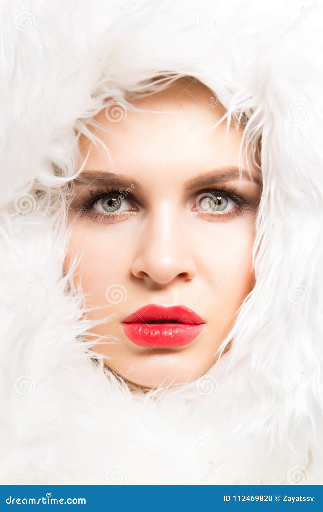 Fashion Studio Portrait of a Beautiful Fair-skinned Woman in White Fur ...