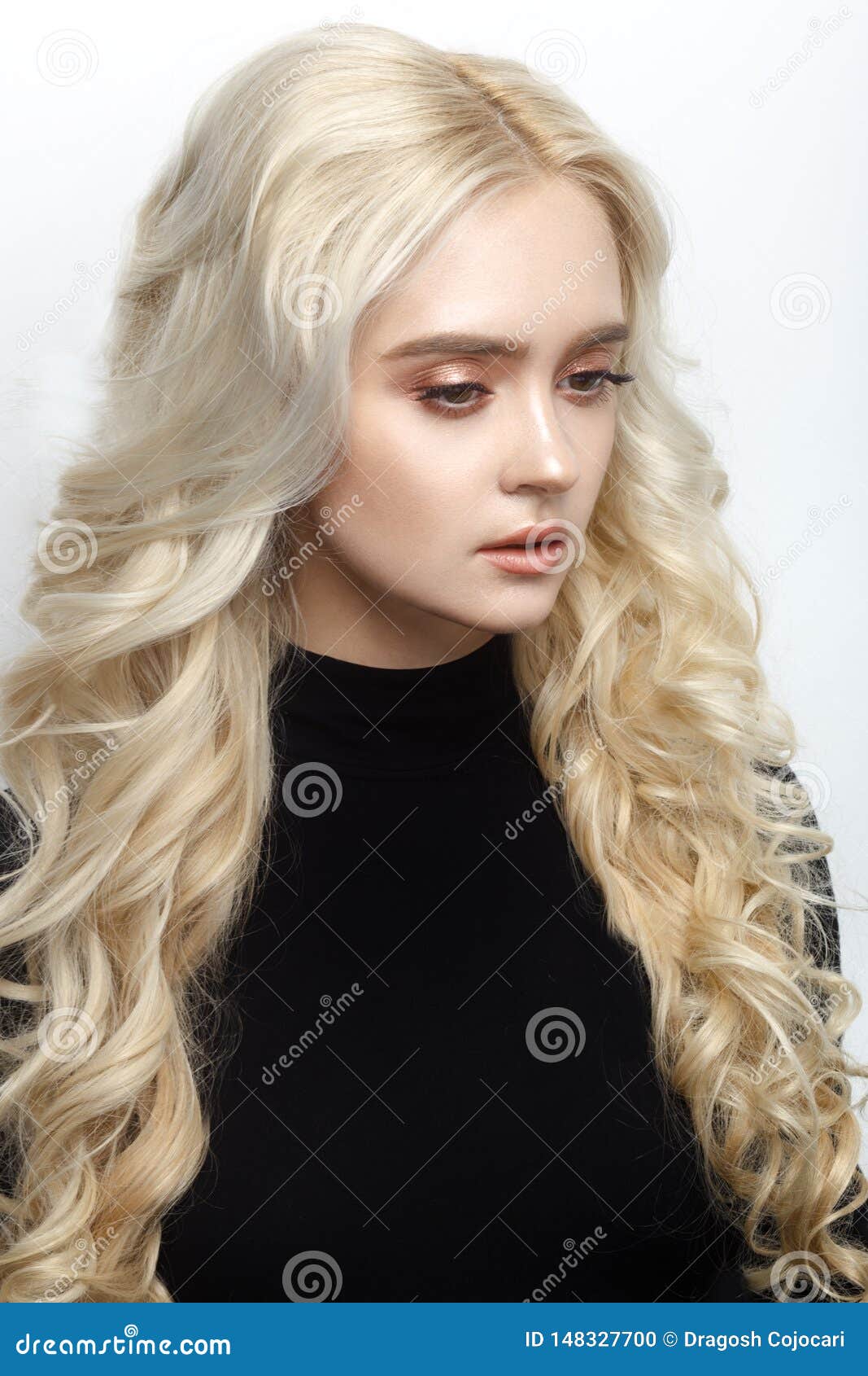 Profile Portrait Of A Woman With Curly Blonde Hairstyle In Black