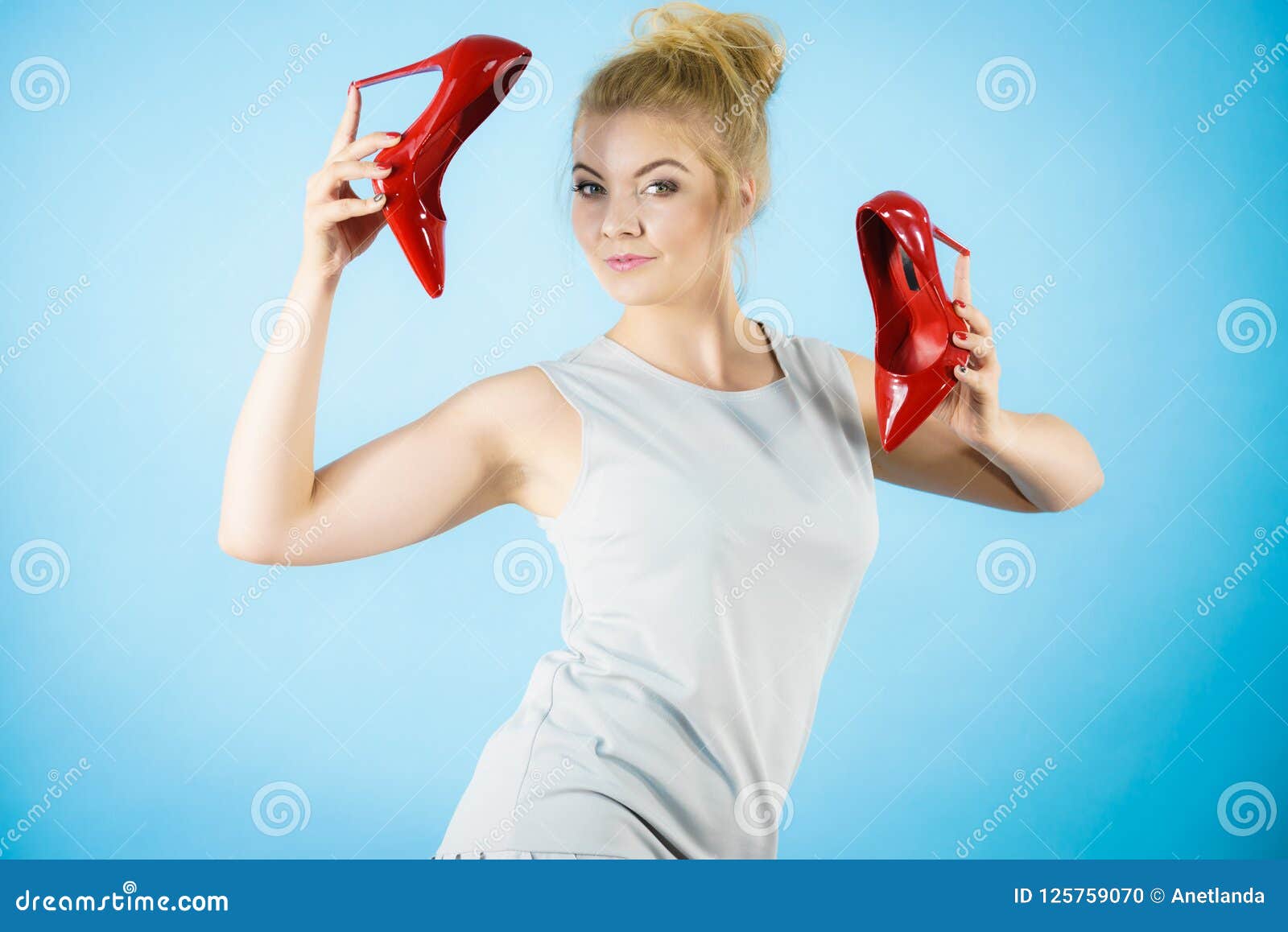 Fashion Stylist Presenting High Heels Stock Photo Image Of Outfit