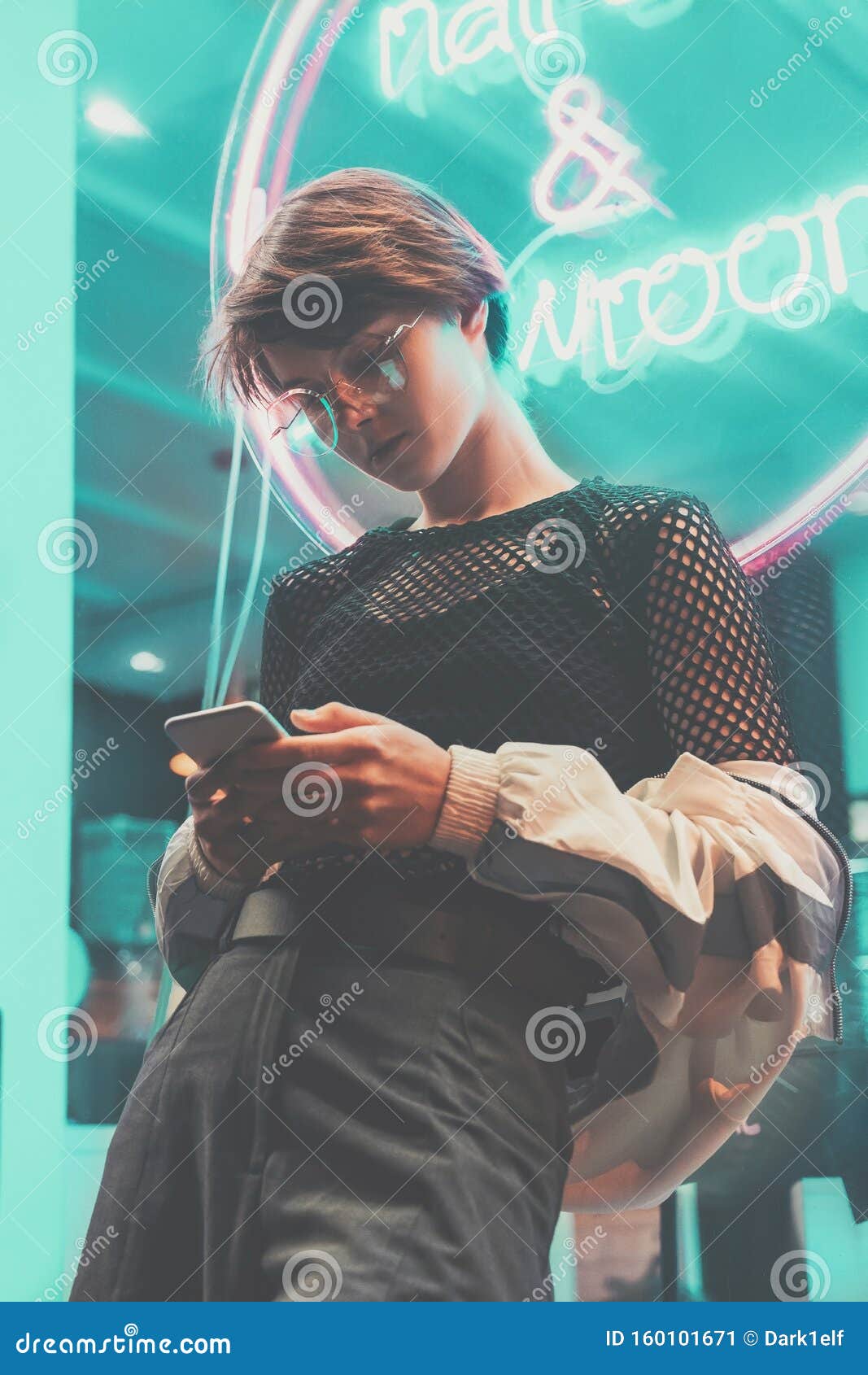 Fashion Teen Hipster Girl Stand Near Neon Sign in Night City Using Phone  Apps Stock Image - Image of clothes, fashion: 160101671
