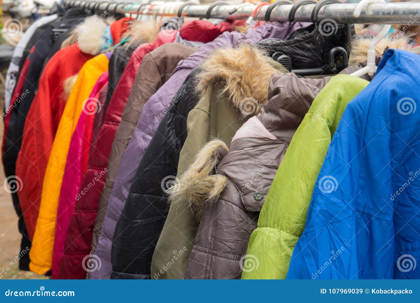 Fashion Winter Coats Hanged on a Clothes Rack Stock Image - Image of ...