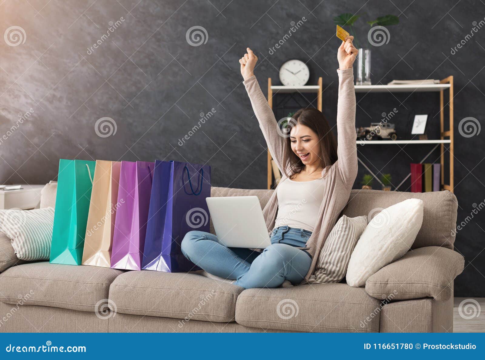 fashion woman buying online with laptop and credit card