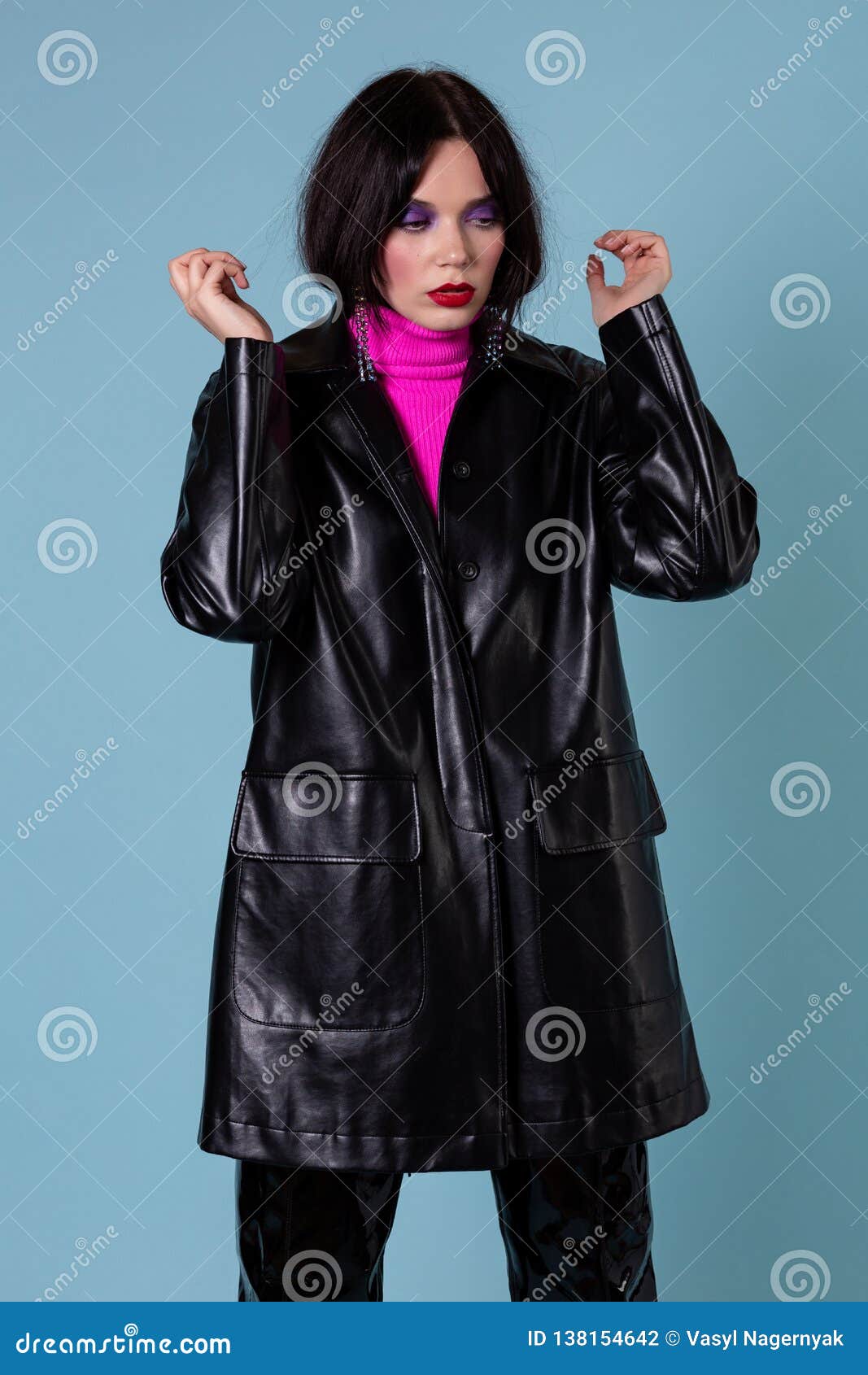 Fashion Woman in Leather Jacket Looking Down in Studio Stock Photo ...