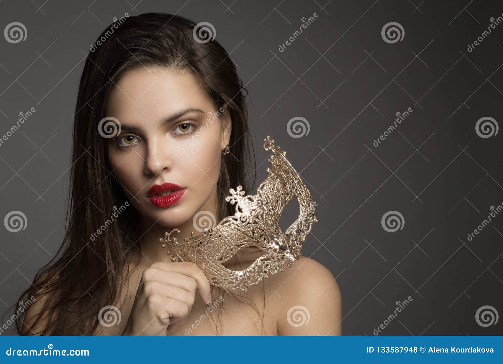 Fashion Woman With Long Hair And Red Lipstick With Golden