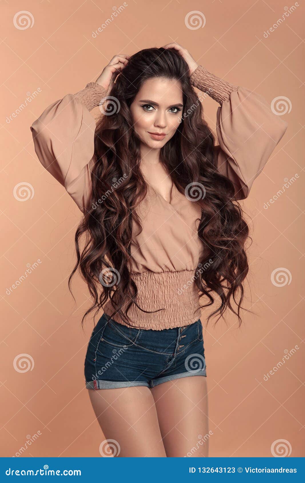 Fashionable Beautiful Girl Wearing Blouse with Long Sleeves and Stock Image  - Image of hairstyle, jeans: 132643123