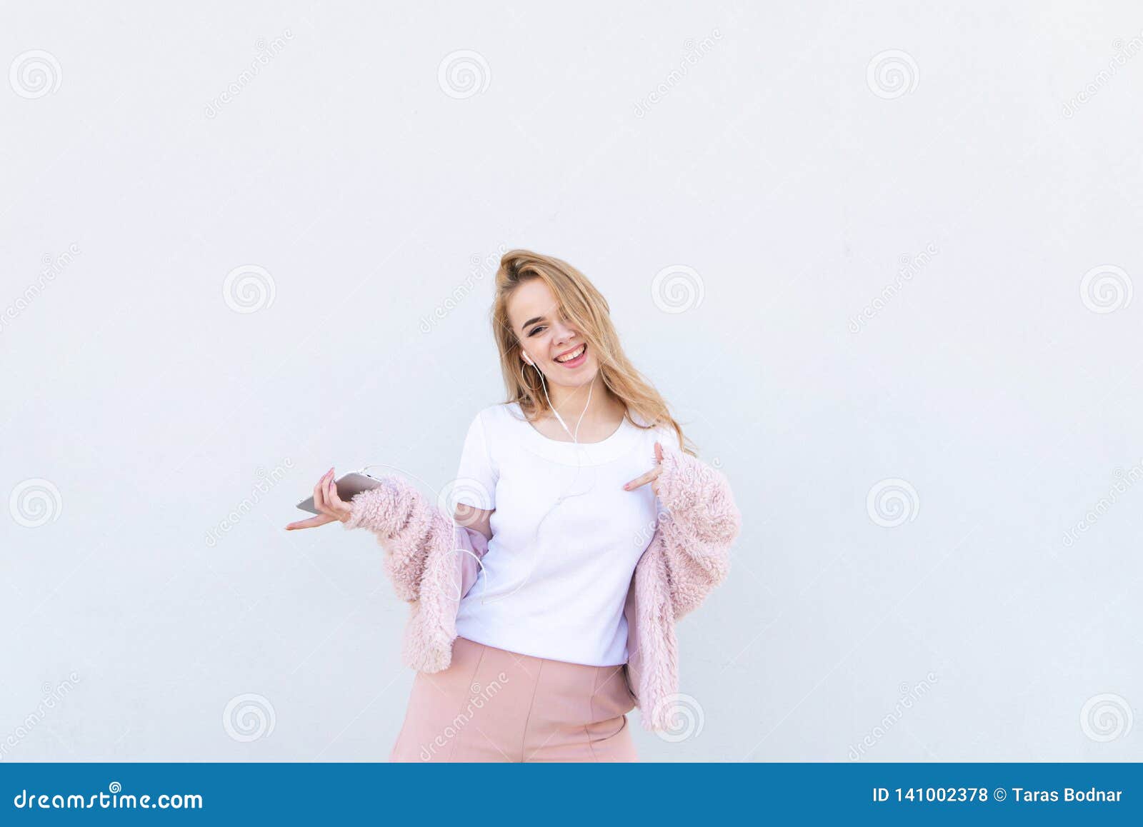 Blonde Teen In A Pink T Shirt