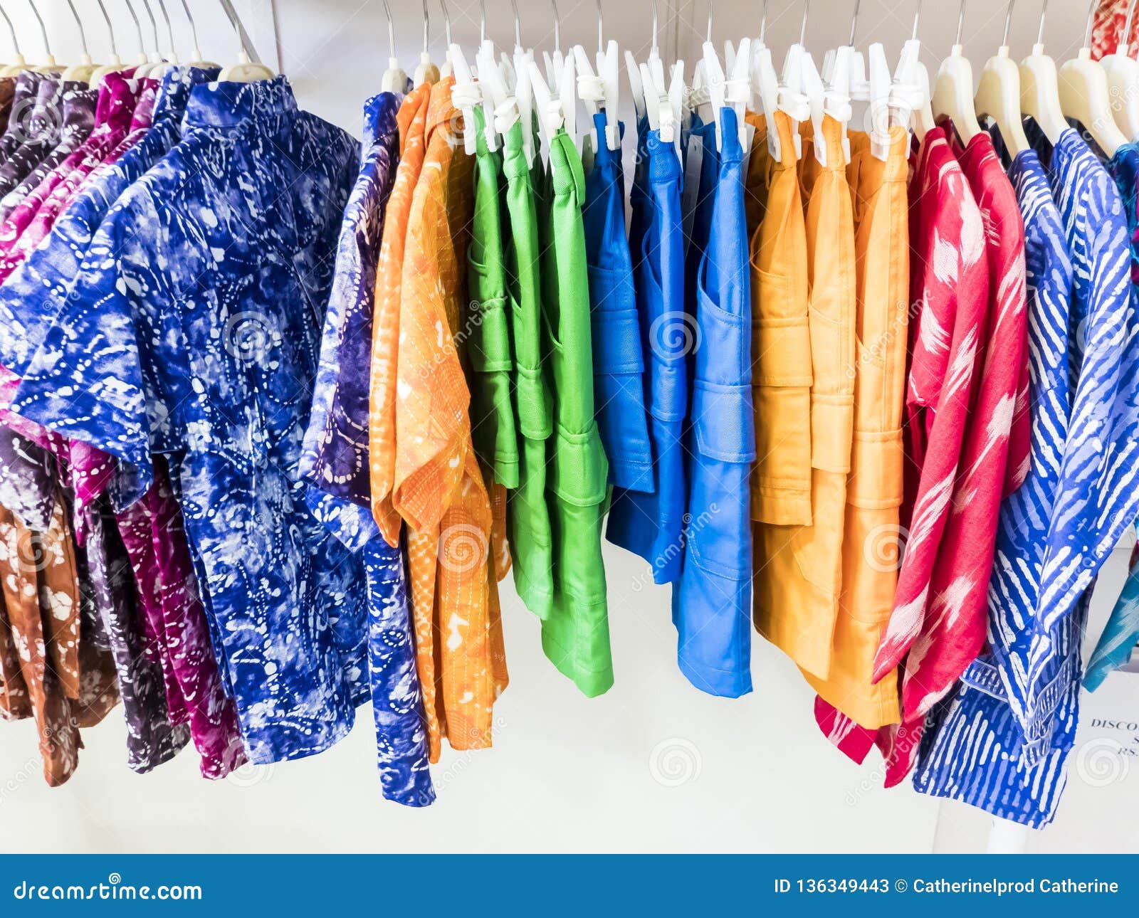 Fashionable Clothes in a Boutique Store Stock Image - Image of colorful ...