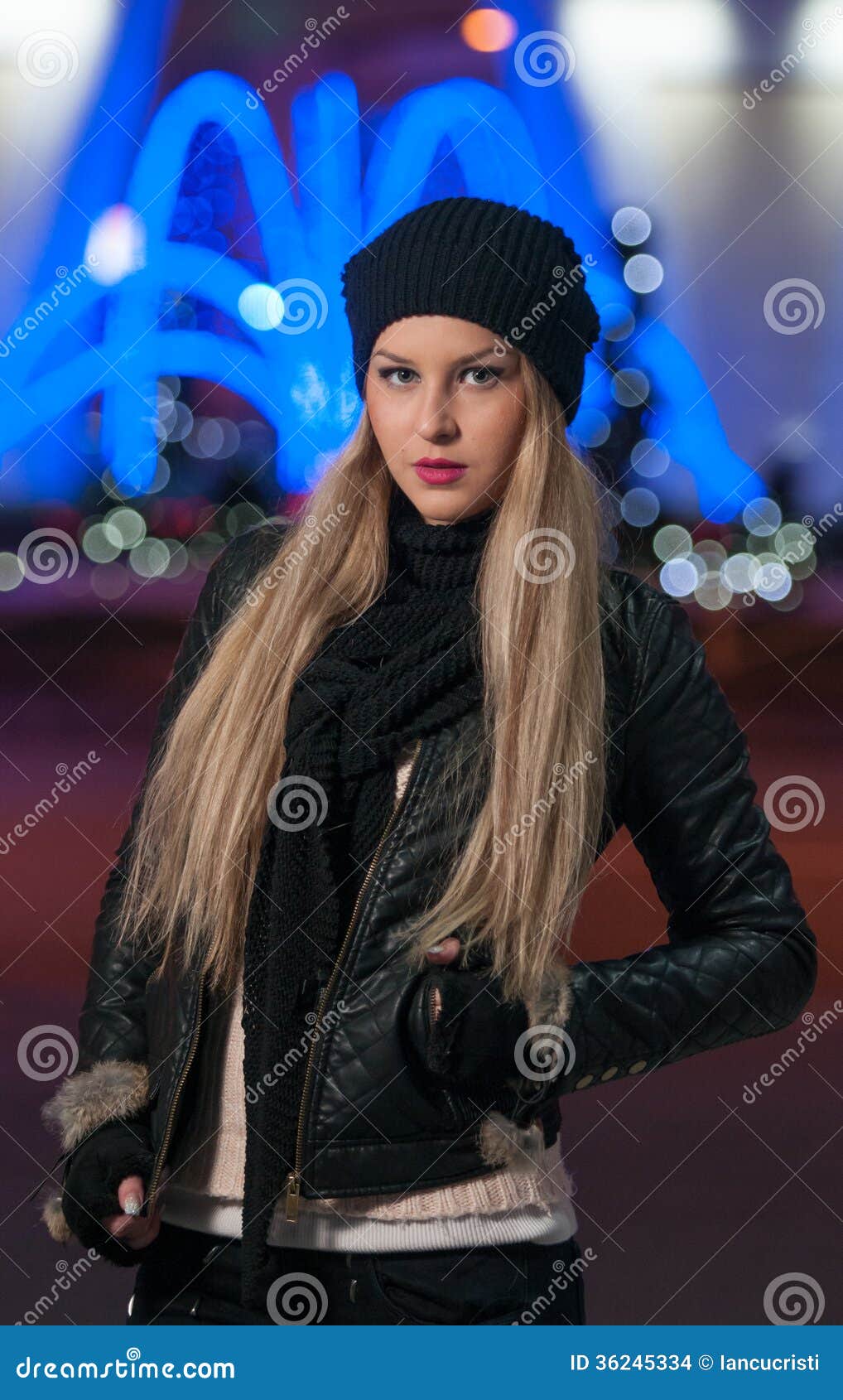 Fashionable Lady Wearing Cap and Black Jacket Outdoor in Xmas Scenery ...