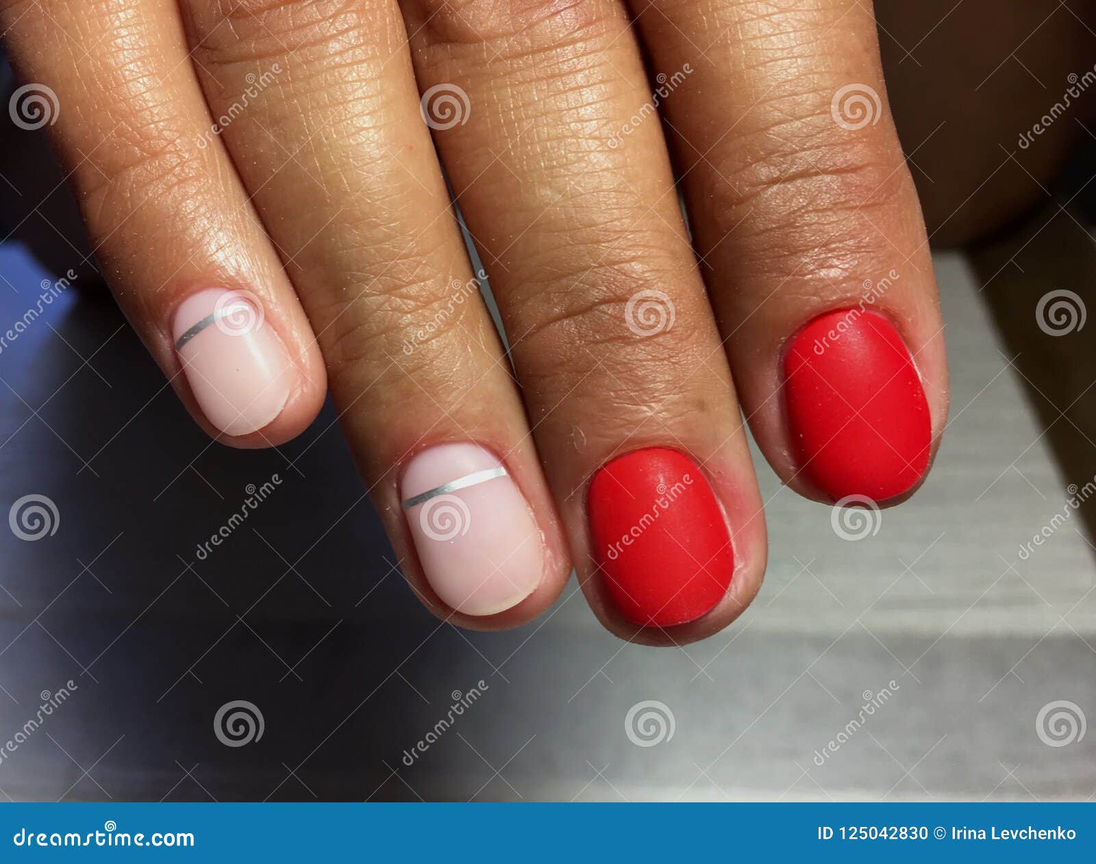 Fashionable Red Matte Manicure With Shiny Silver Stock Photo Image Fashionable Red Matte Manicure With Shiny Silver Stock Photo Image