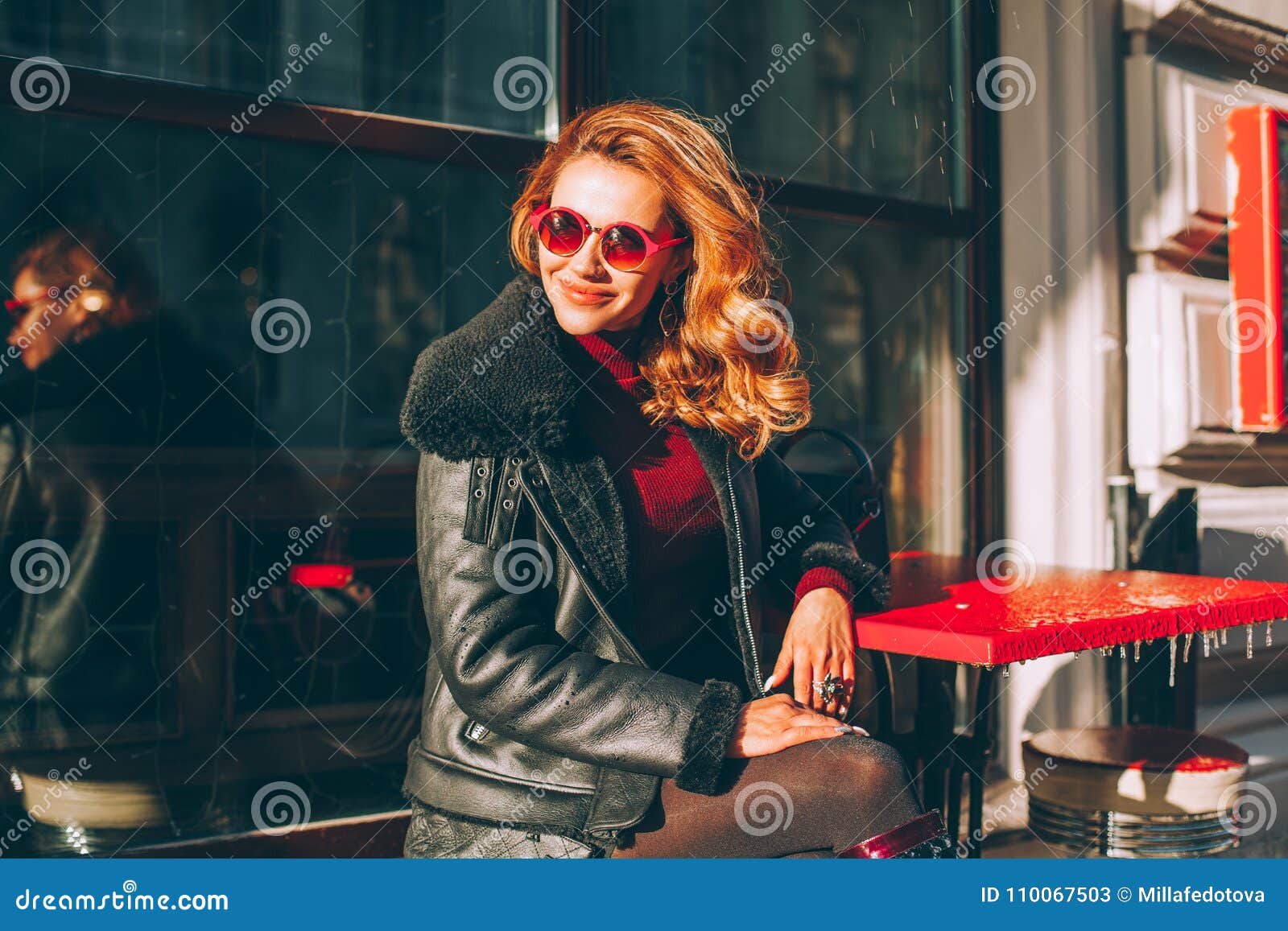 Fashionable Redhead Woman in Black Jacket and Red Sunglasses Stock ...