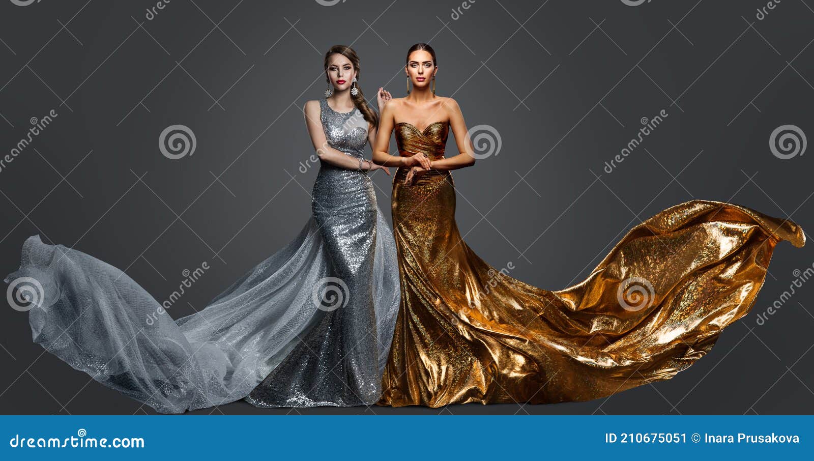 fashionable two woman in golden evening dress and silver gown. glamour beauty model fashion prom clothes with train. studio