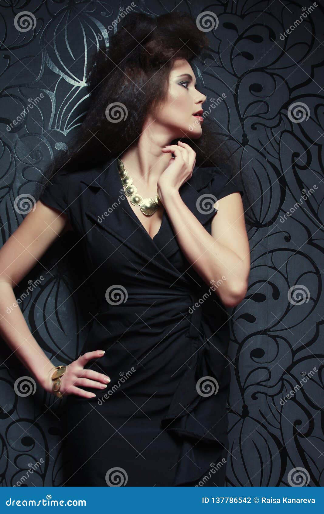 Fashionable Woman in Black Dress. Studio Shot Stock Photo - Image of ...