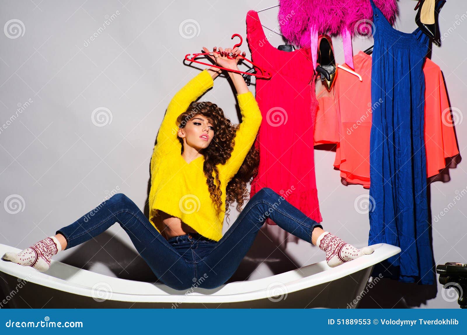 Fashionable Woman with Her Clothes Stock Image - Image of face, hang ...