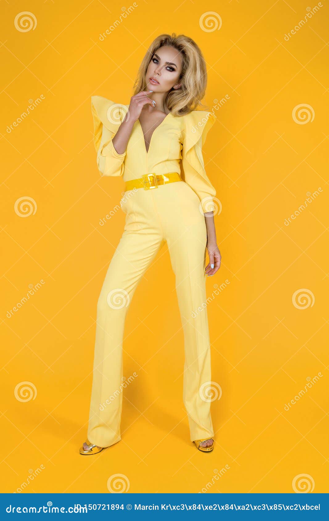 Fashionable Woman in Nice Yellow Jumpsuit, Shoes and Accessories ...