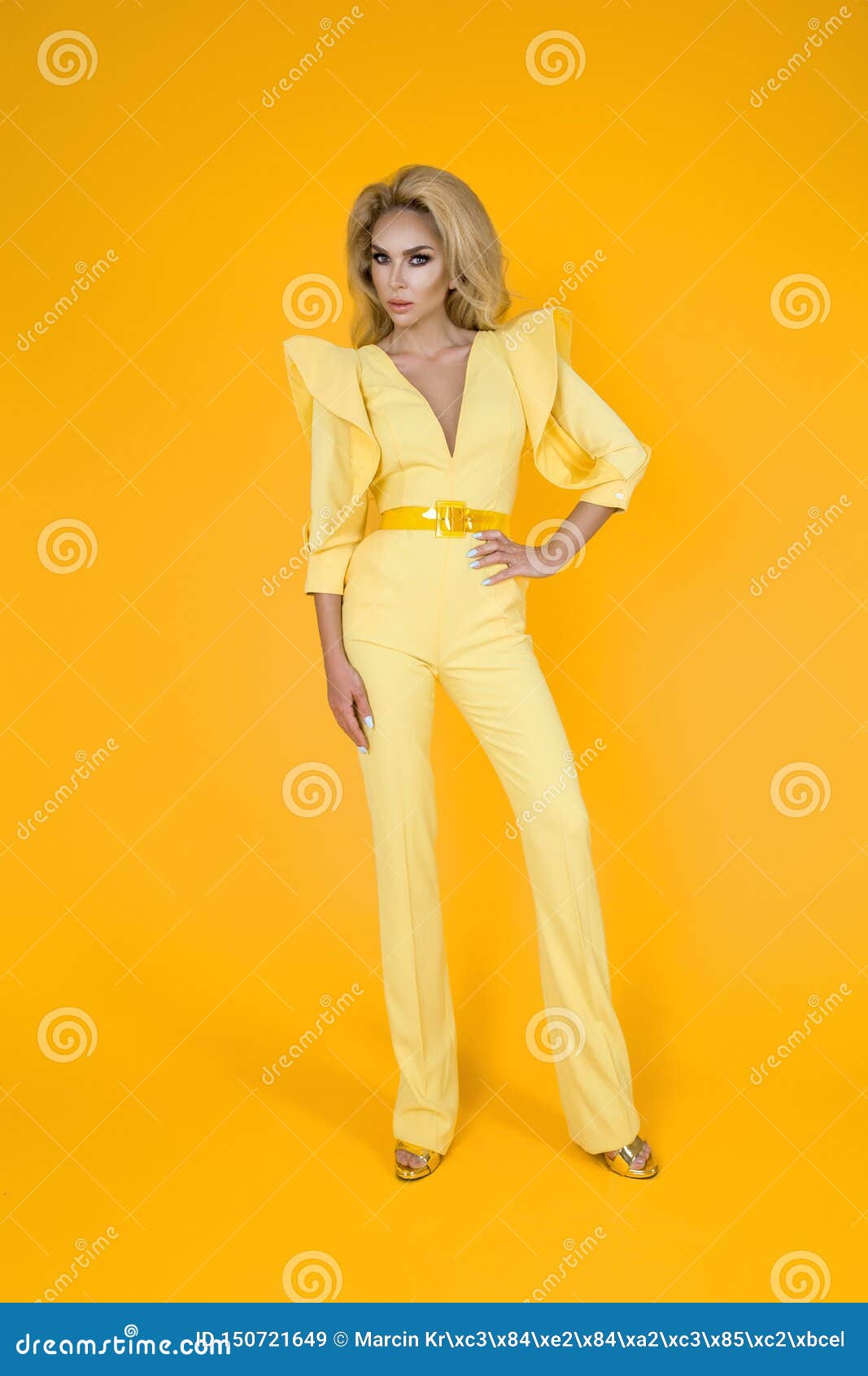 Fashionable Woman in Nice Yellow Jumpsuit, Shoes and Accessories ...