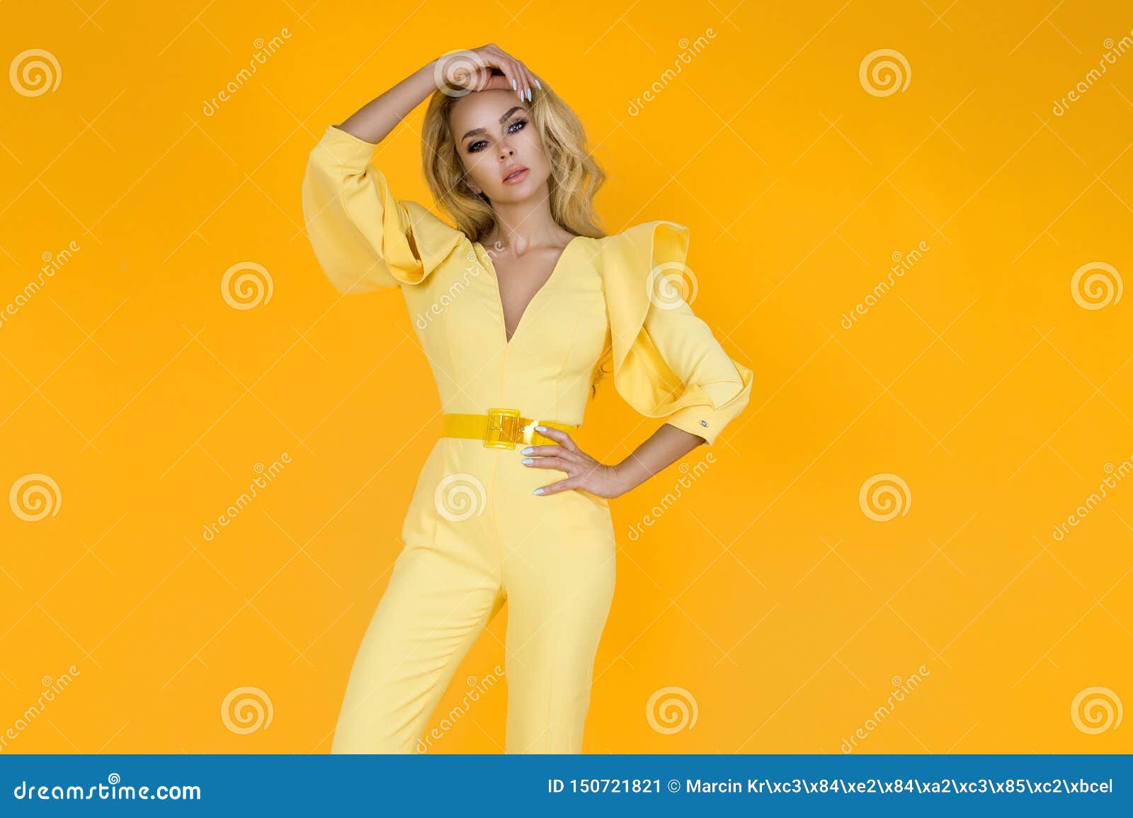 Fashionable Woman in Nice Yellow Jumpsuit, Shoes and Accessories ...