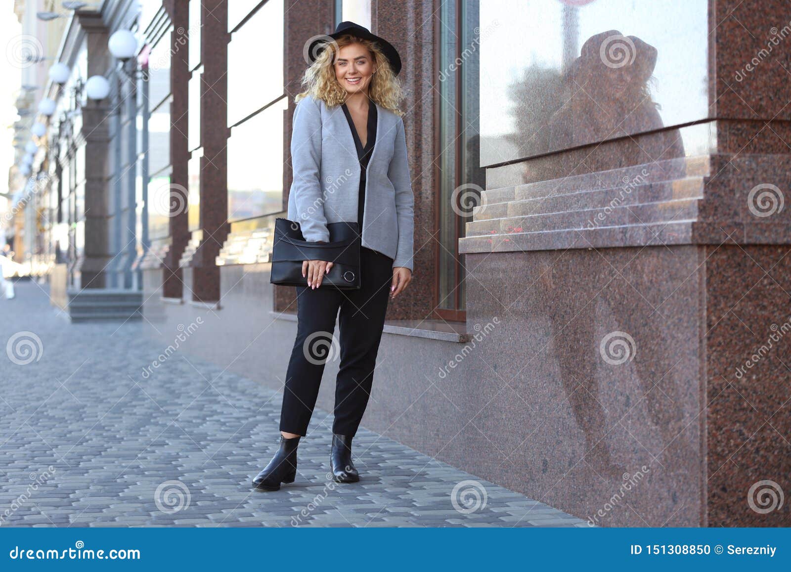 fashionable young woman outdoors fashionable young woman outdoors 151308850