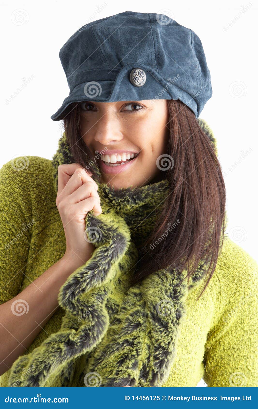 fashionable young woman wearing knitwear in studio