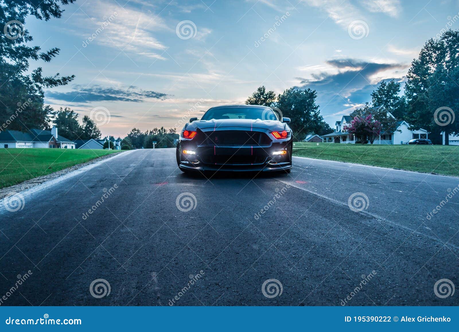 fast american power muscle car at sunset on road
