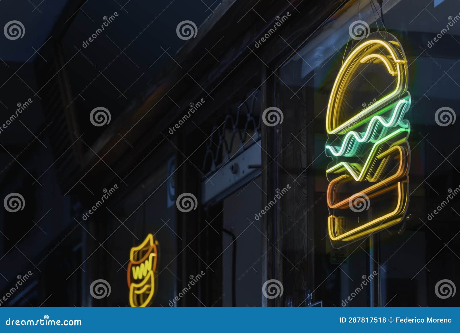 Fast Food Establishment with a Hamburger Neon Sign Stock Photo Image
