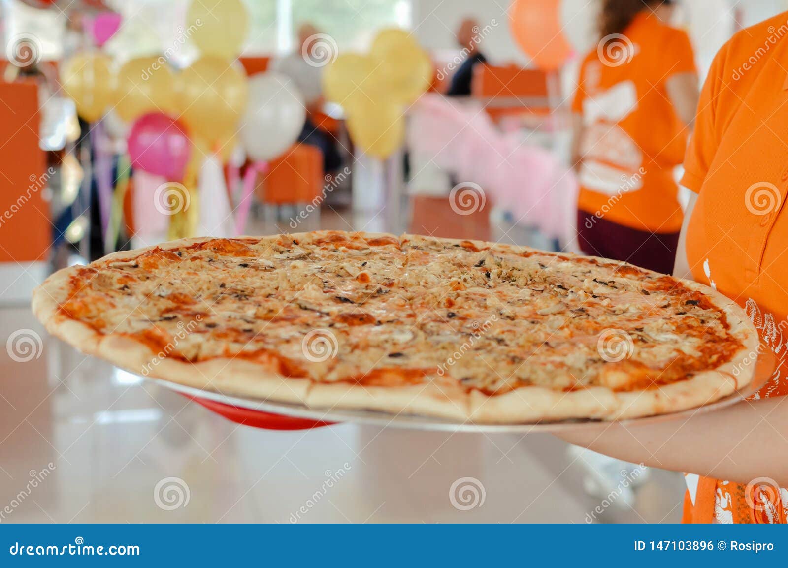 Fast Food Pizza Birthday Party In Cafe With Balloons Stock Photo fast-food-pizza-birthday-party-in-cafe-with-balloons-stock-photo