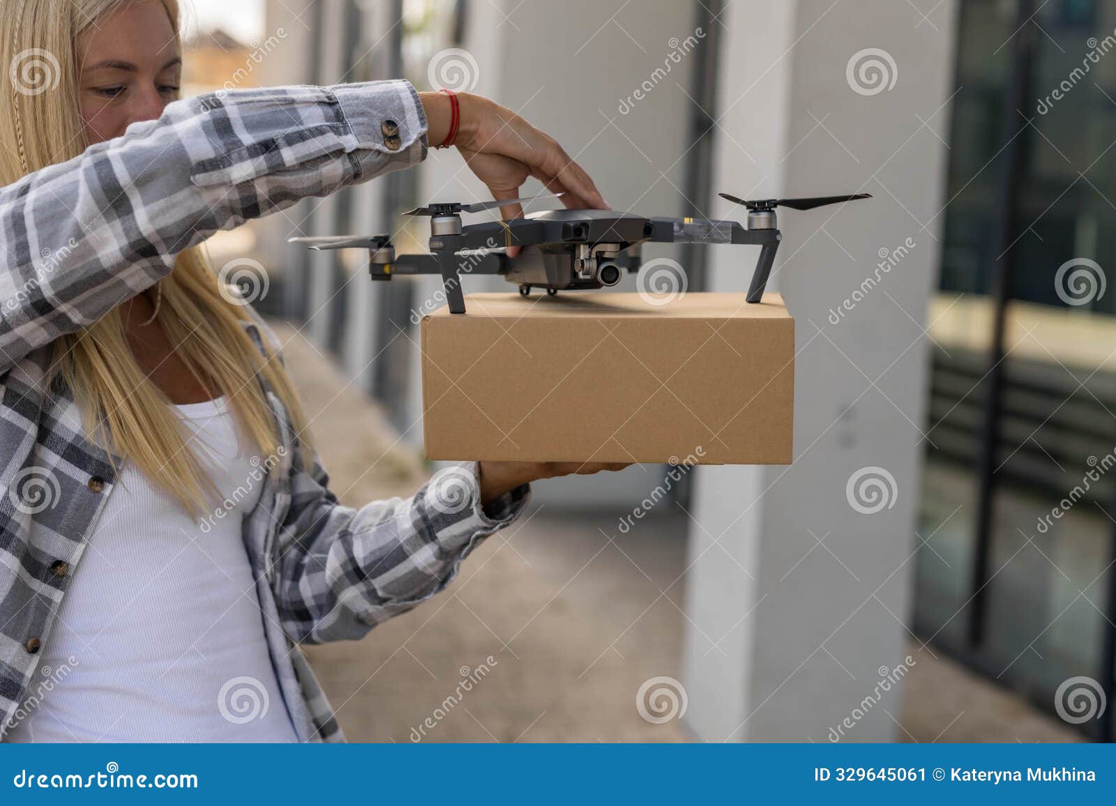 fast and safe delivery. a drone delivers a gift to a girl, contactless delivery