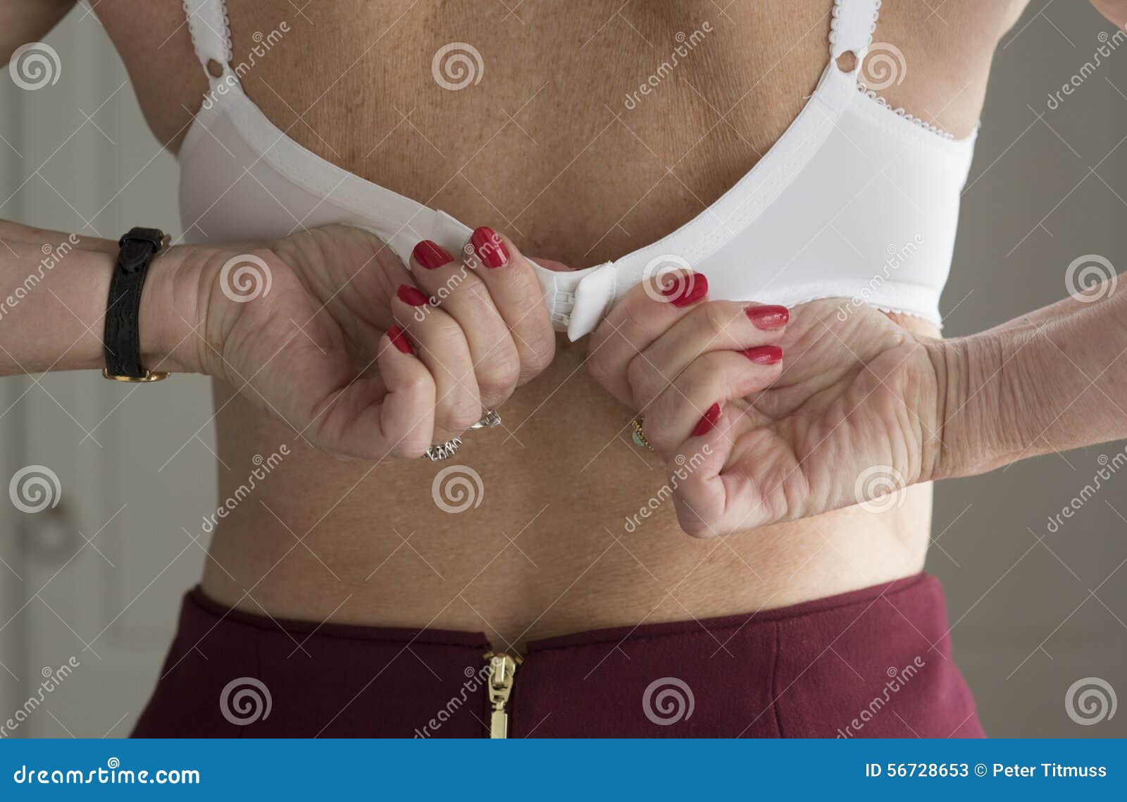 Fastening a woman s bra stock image. Image of woman, clip - 56728653