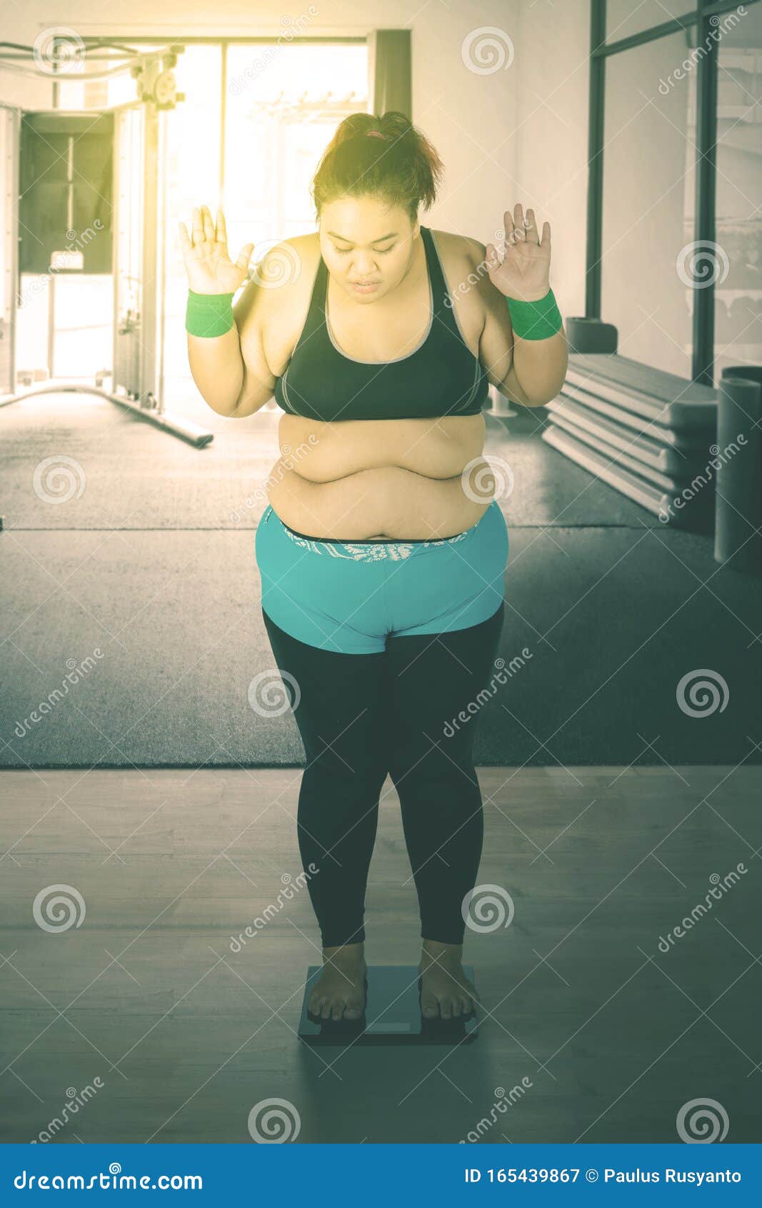 Fat Oriental woman suffocates mate