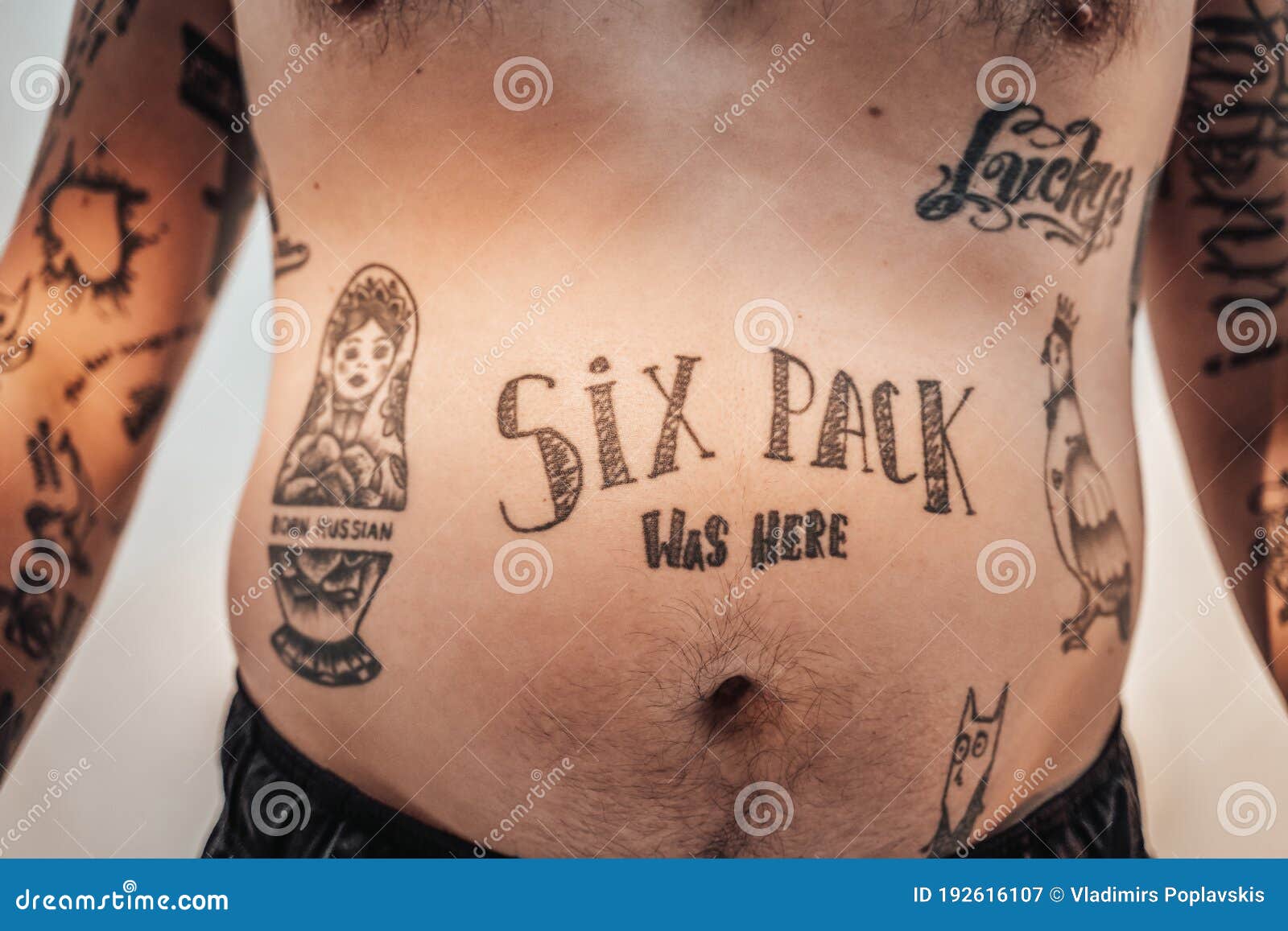 Stomach Lettering tattoo men at theYoucom