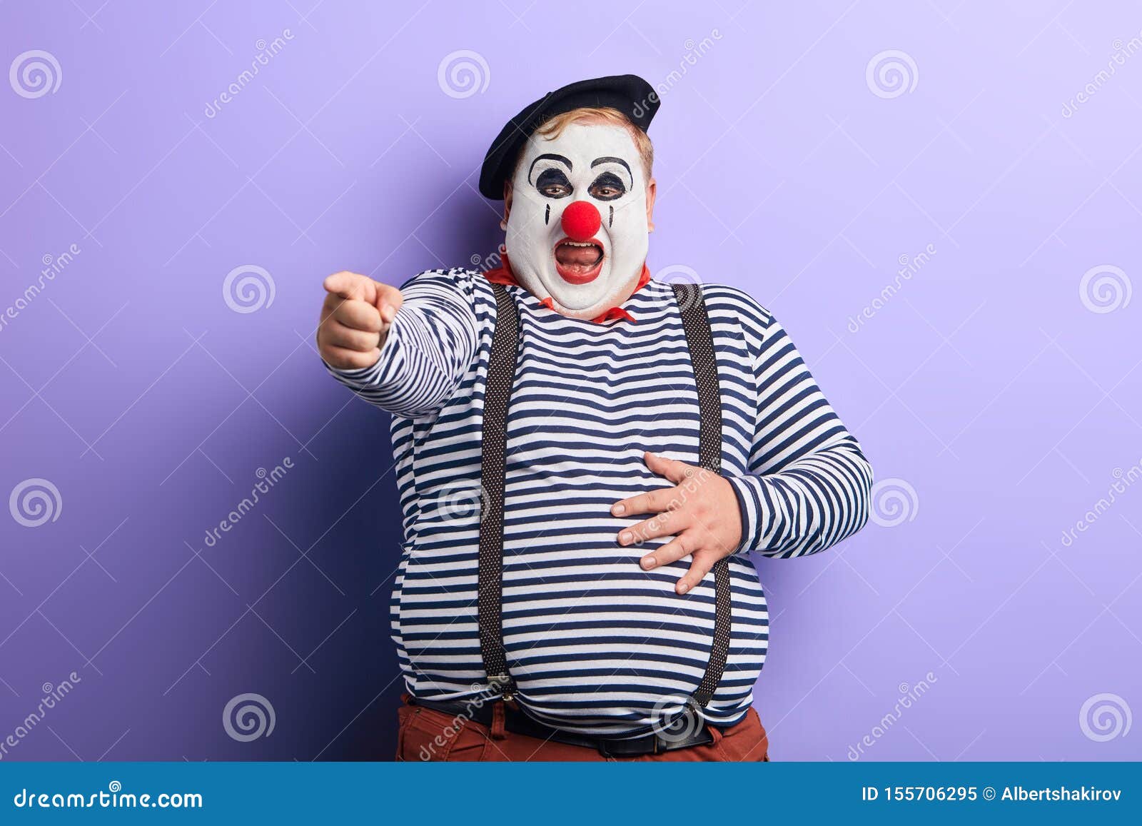 fat-clown-showing-direction-index-finger-isolated-blue-background-studio-shot-ha-ha-artist-heartly-chuckle-close-up-photo-fat-155706295.jpg