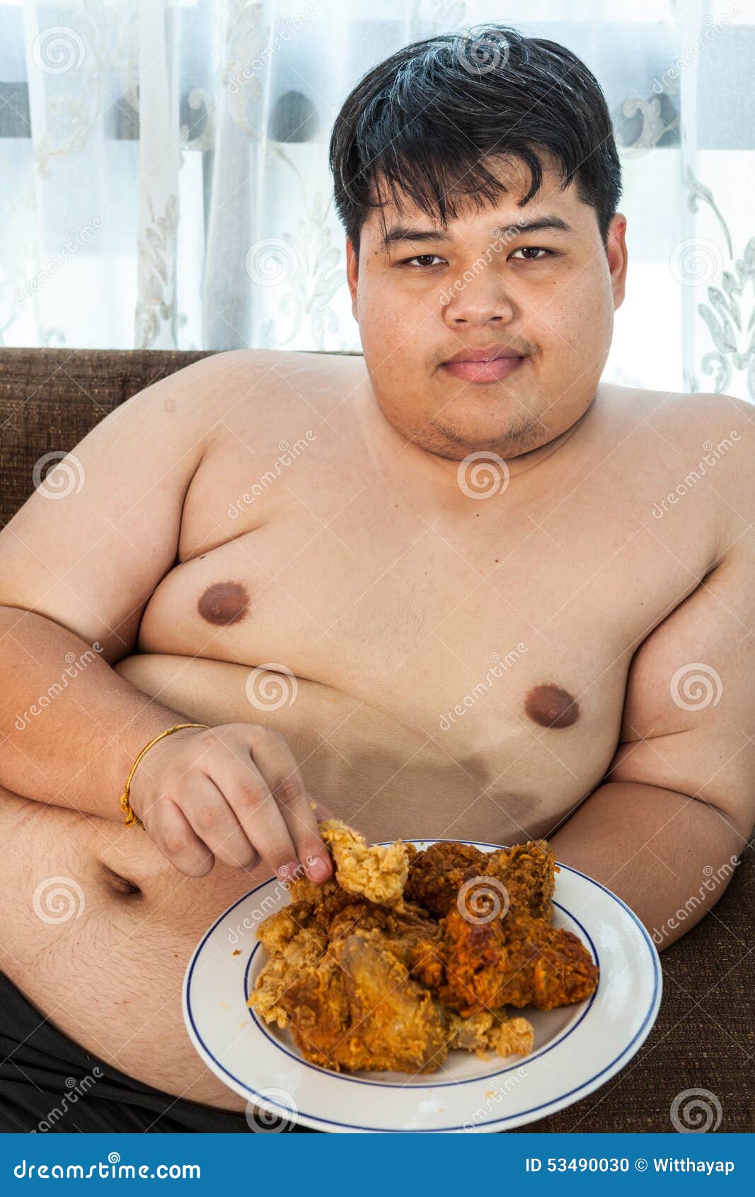 fat-man-eating-fried-chicken-asian-53490