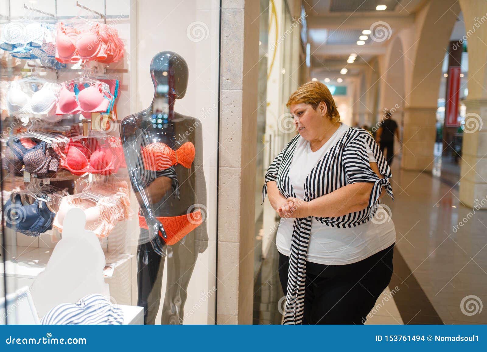 Fat Woman Near the Showcase with Underwear Stock Photo - Image of
