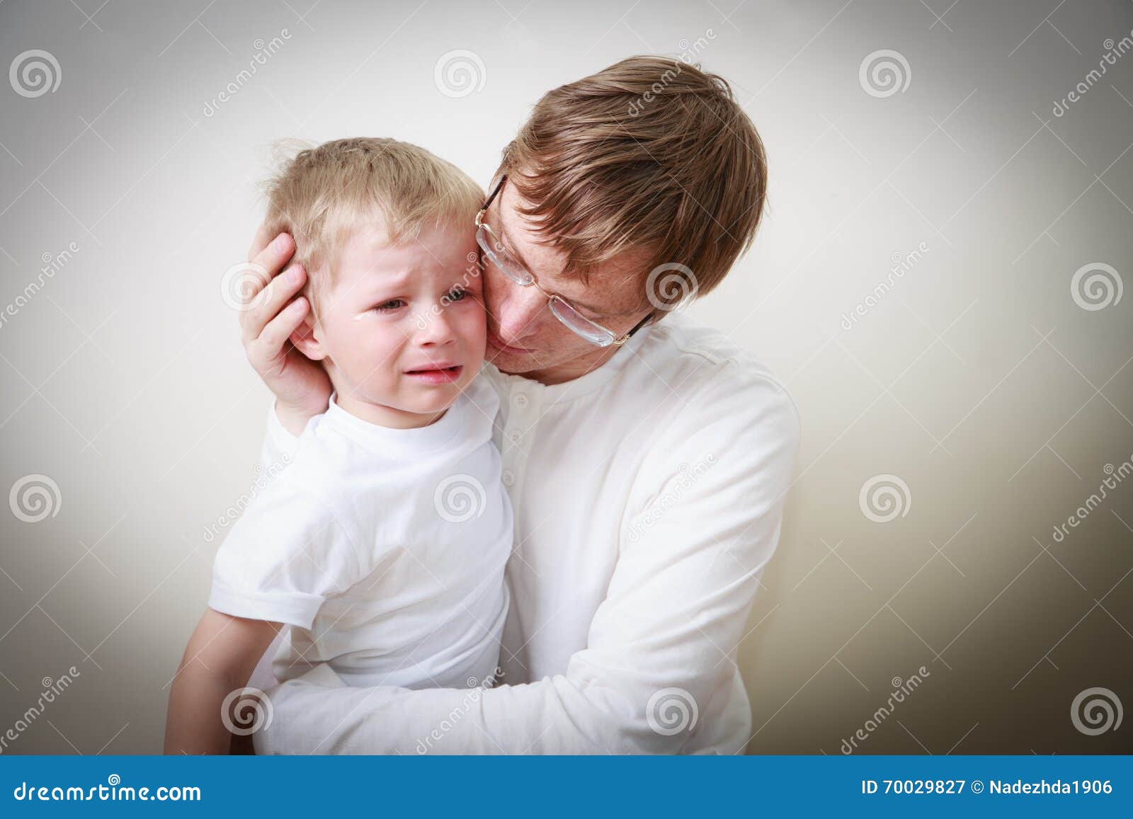 Father Comforting Her Crying Little Son Stock Image Image of