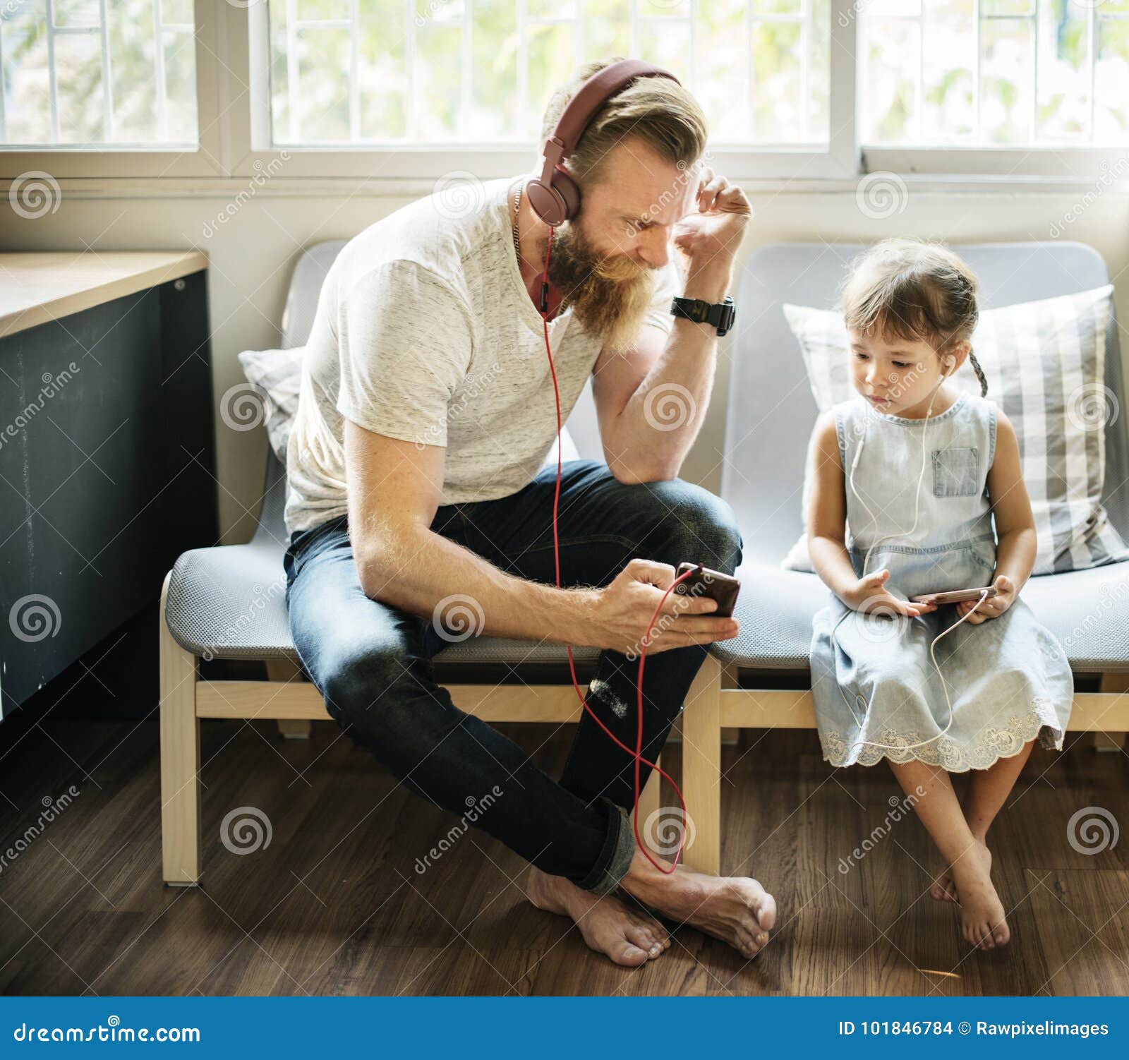 father daughter entertainment family earphone concept