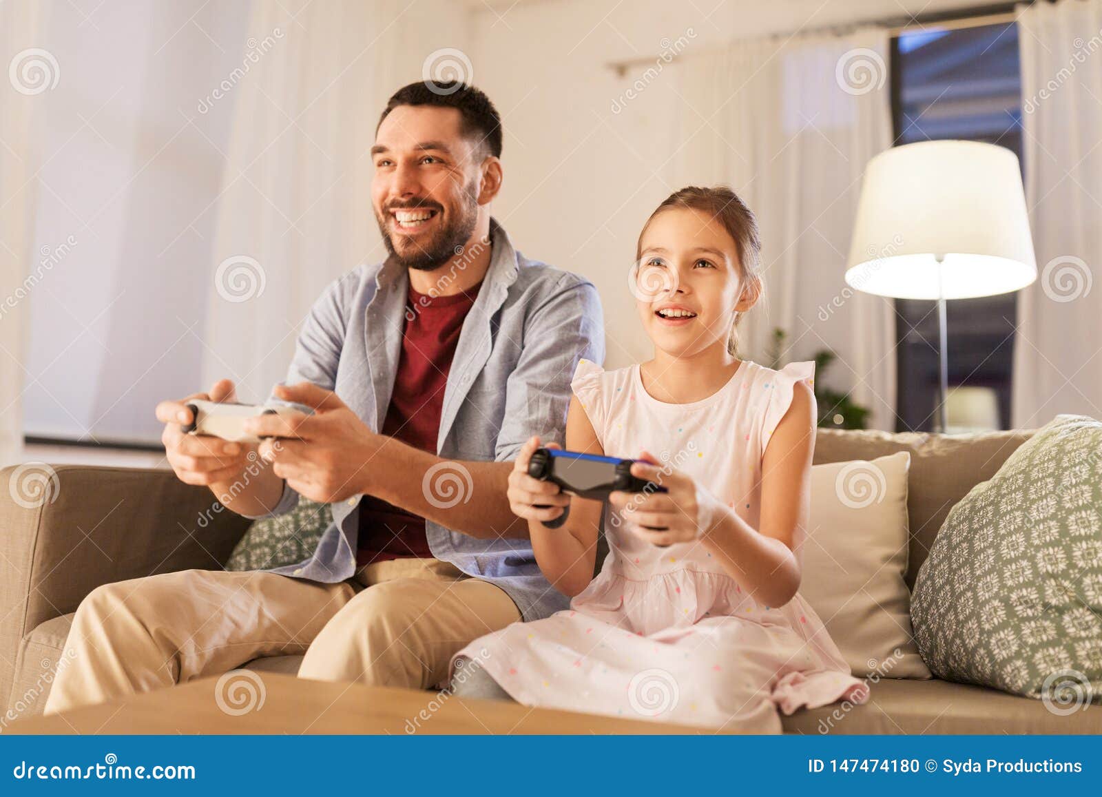 https www dreamstime com father daughter playing video game home family gaming entertainment concept happy little gamepads image147474180