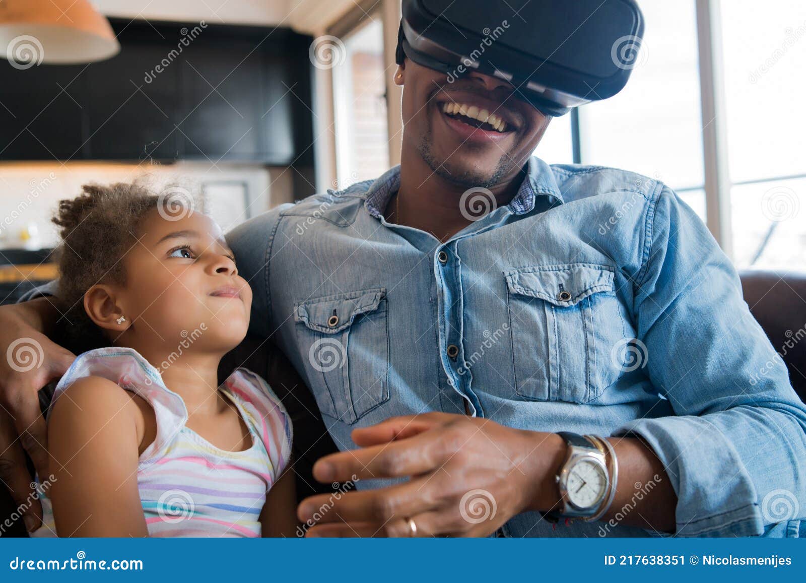 father and daughter playing video games.