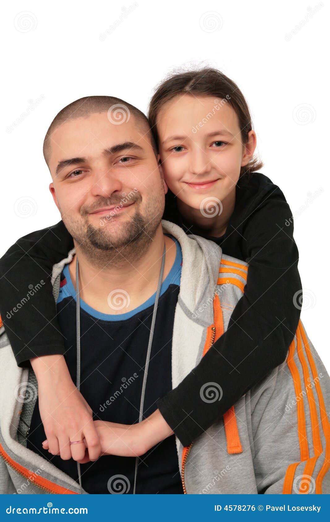 Father with daughter posing on white