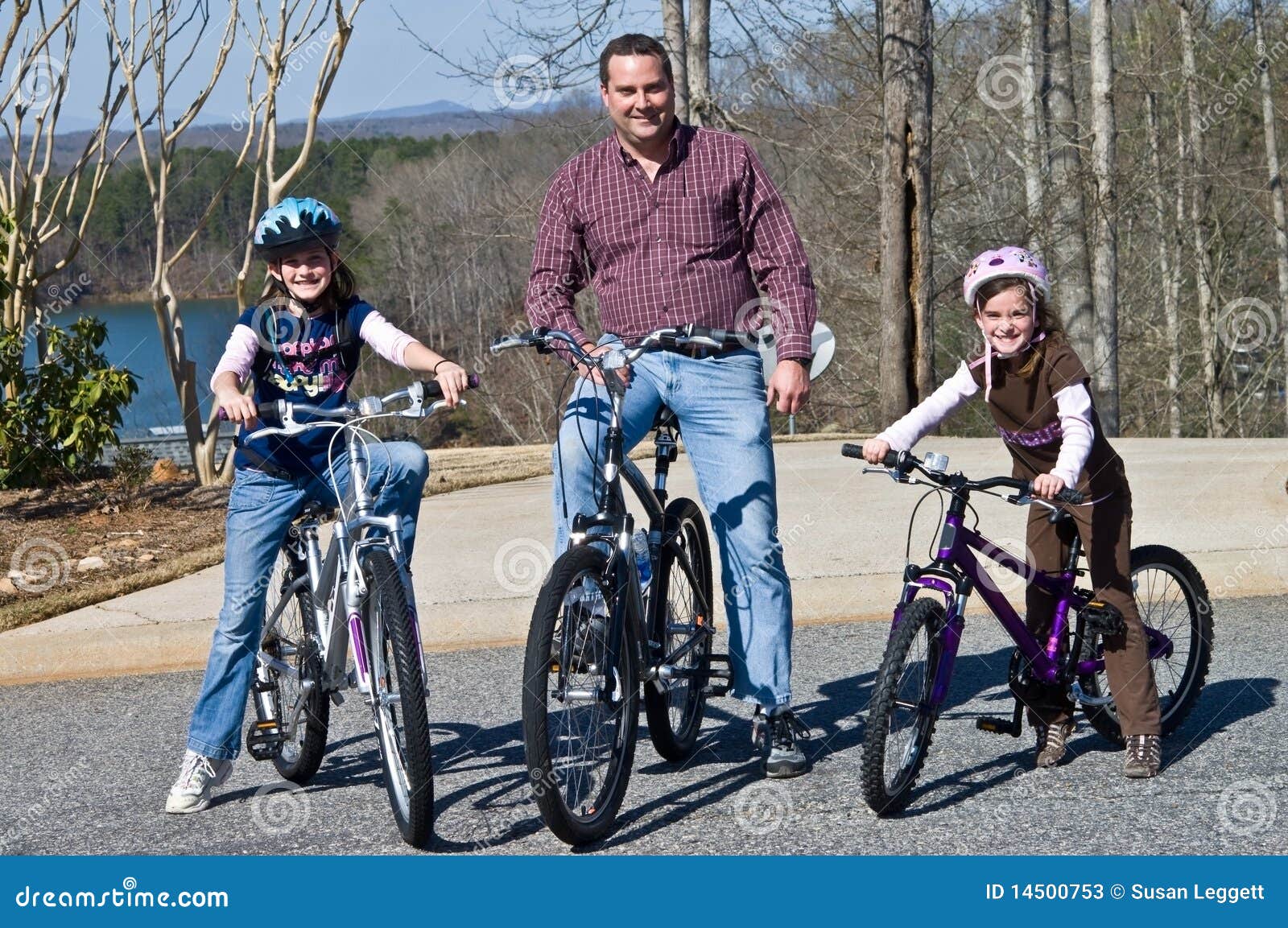 father and daughters bike riders
