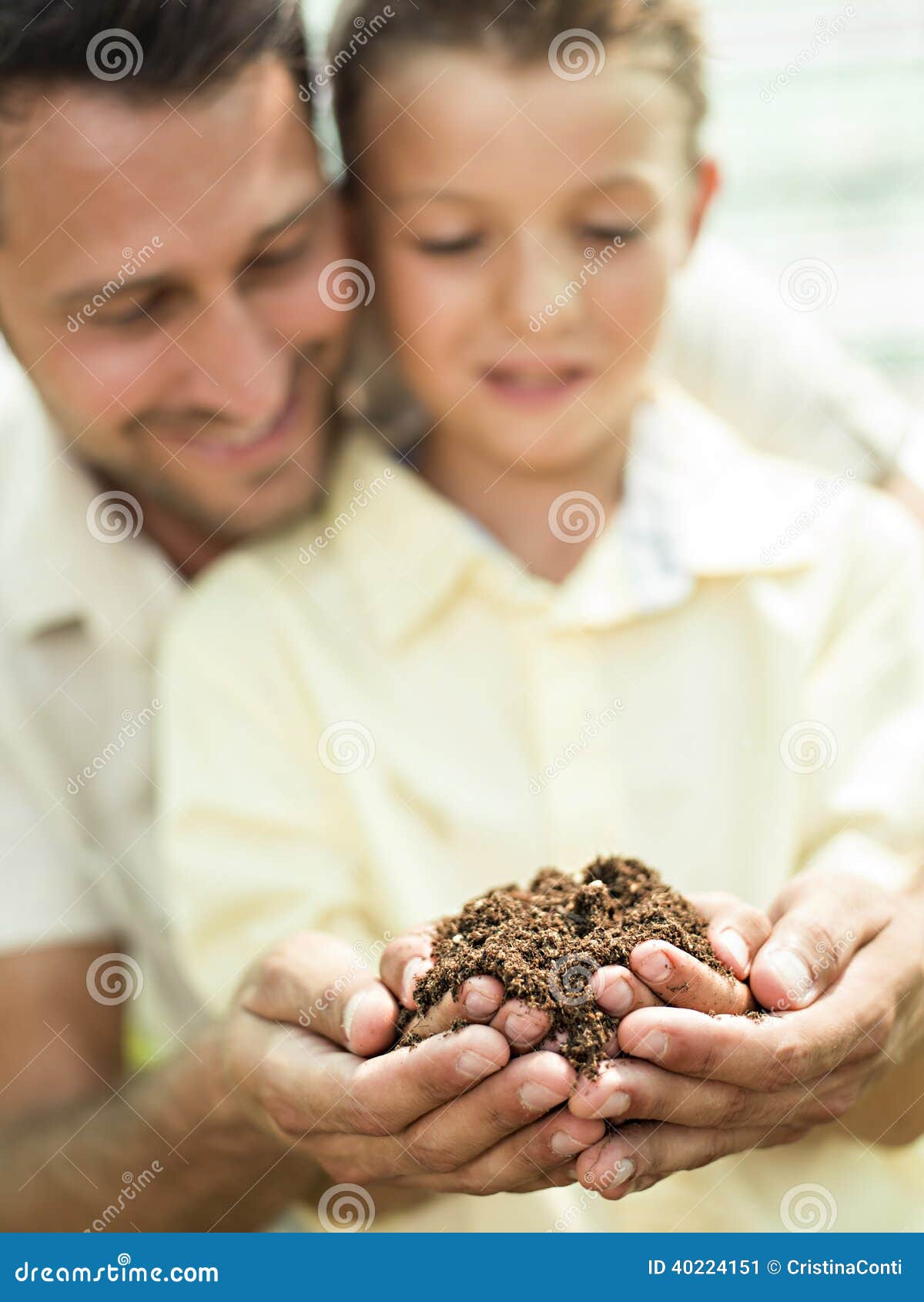father educate son to care a soil
