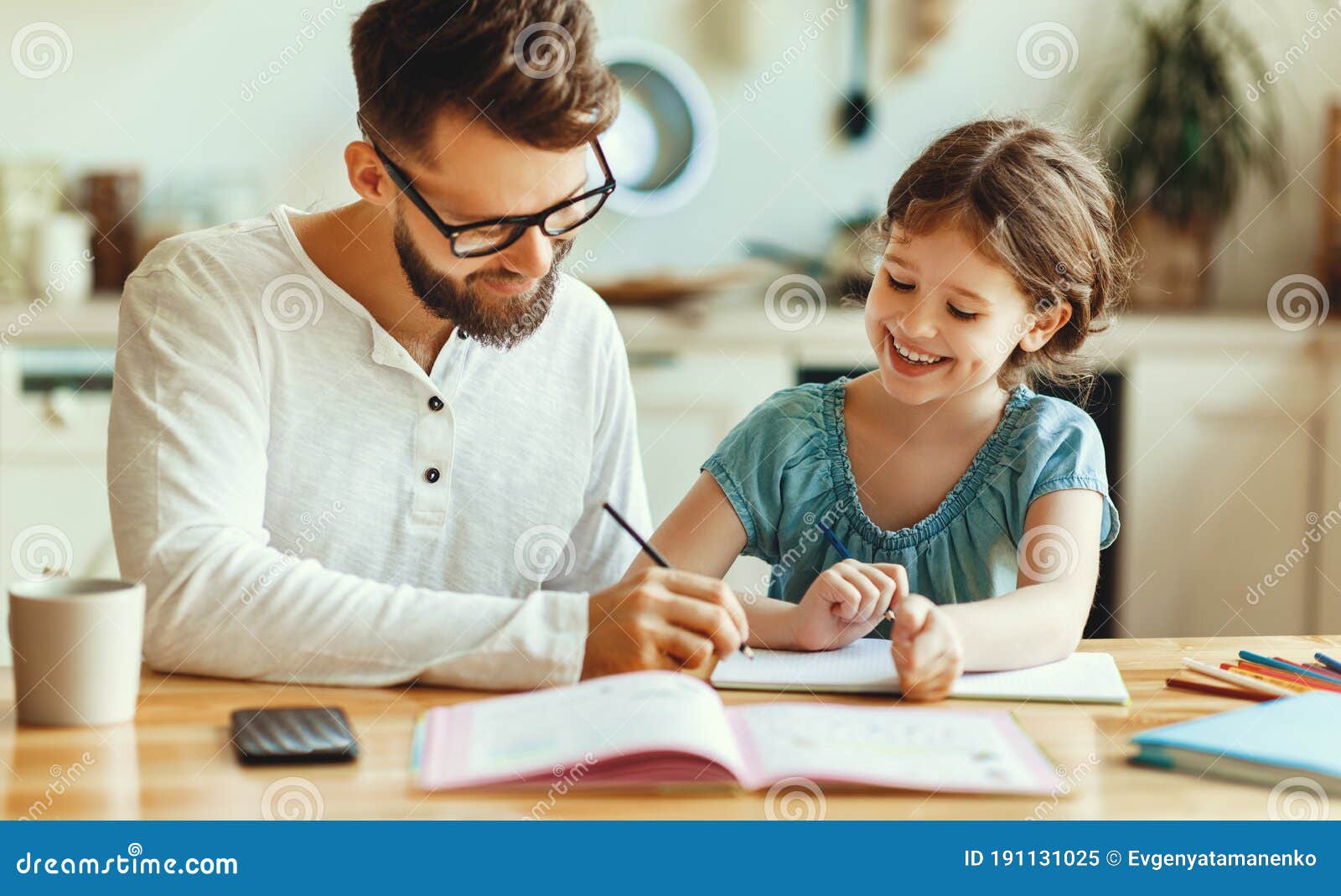 dad helping kid with homework