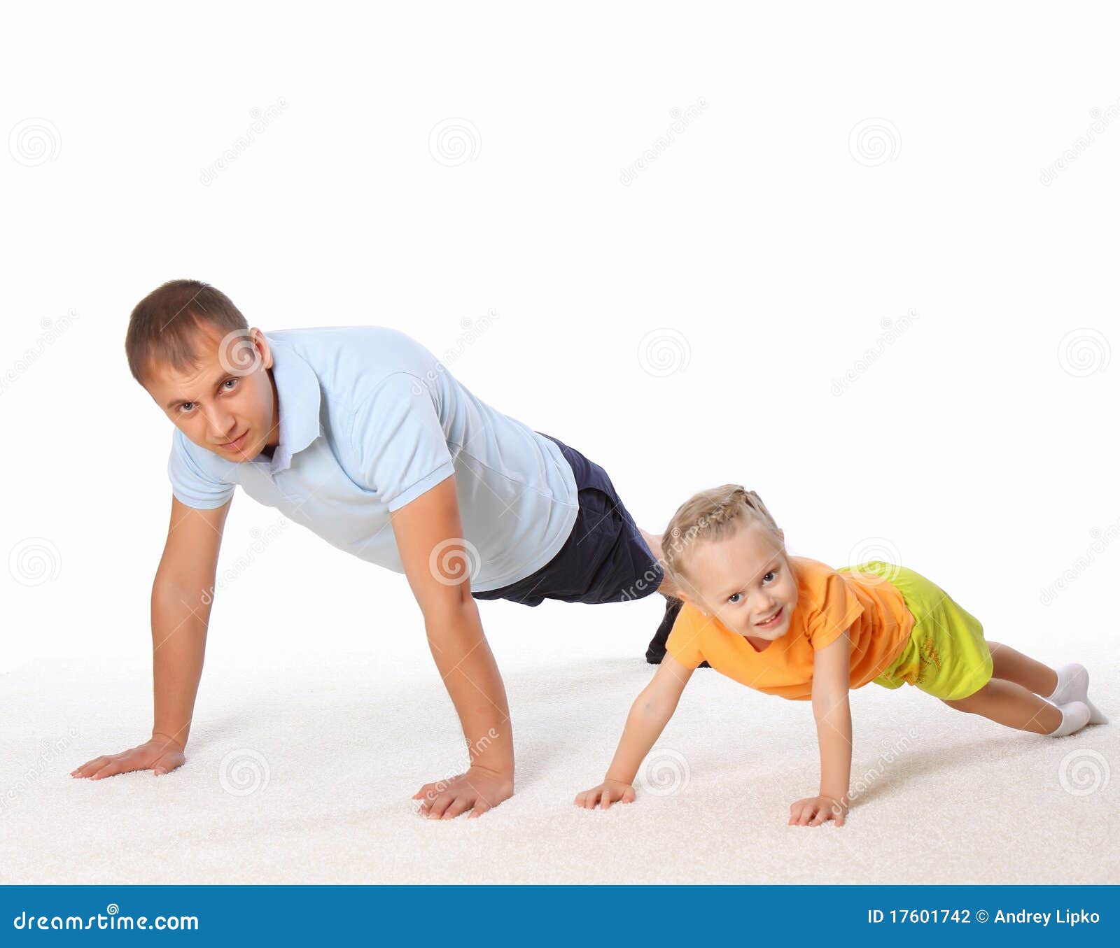 The Father And His Little Daughter Doing Exercises Stock Photography