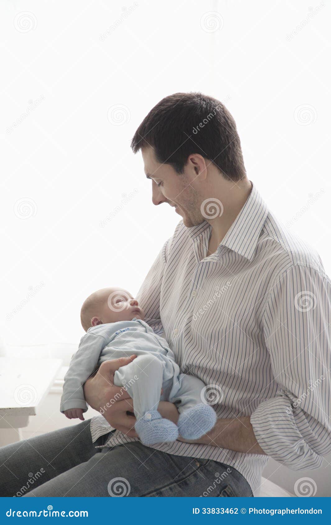 Father Holding Newborn Baby At Home Stock Photography - Image: 33833462