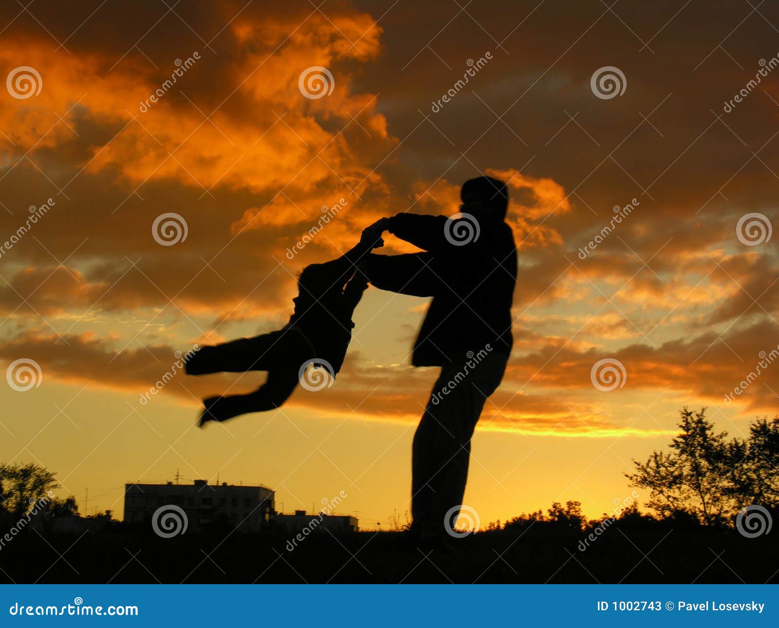 father rotate son sunset