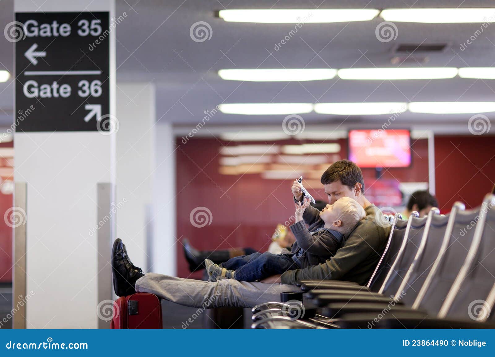 Father and Son at the Airport Stock Photo Image of chair, lifestyle